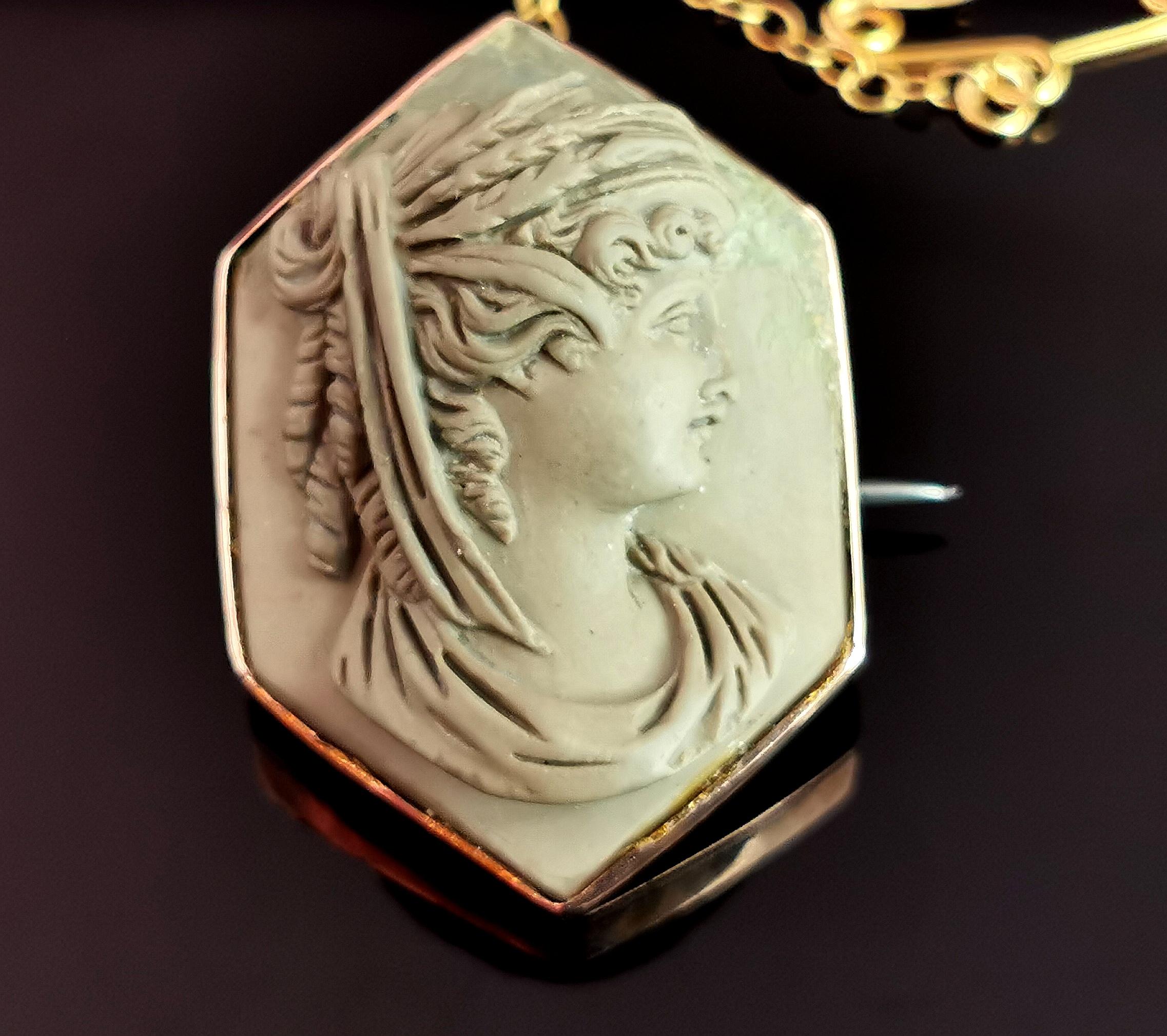 A beautiful antique, late 19th century Lava Cameo brooch.

It has a typical dark beige tone, finely carved with the profile of a classical lady.

Lava Cameos and Lava stone jewellery rose to fashion in the Grand Tour era, early 19th century.

They