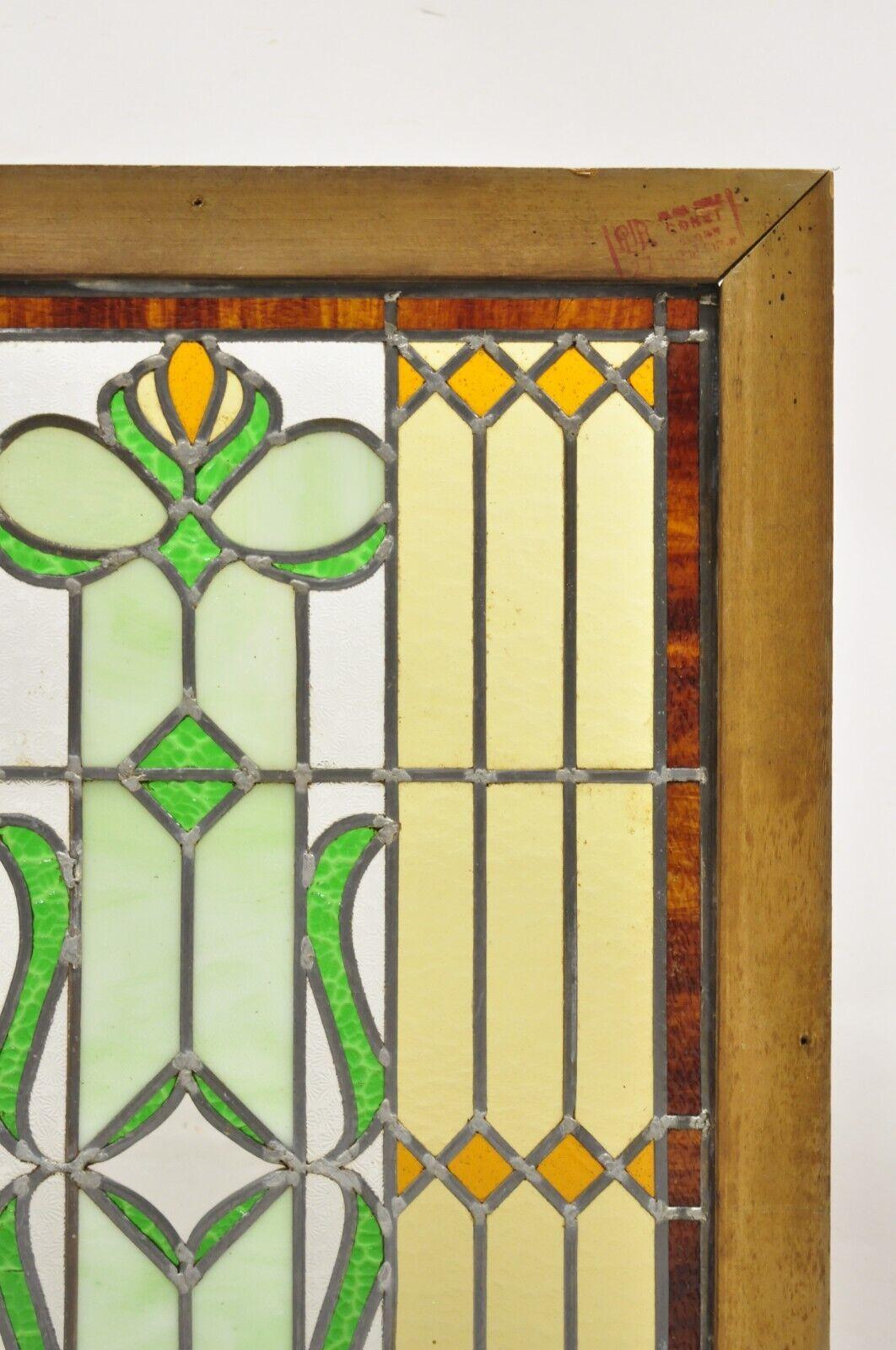 Antique Victorian Leaded Stained Glass Green Amber Tortoise Window in Wood Frame. Circa Early 1900s. Measurements: 44