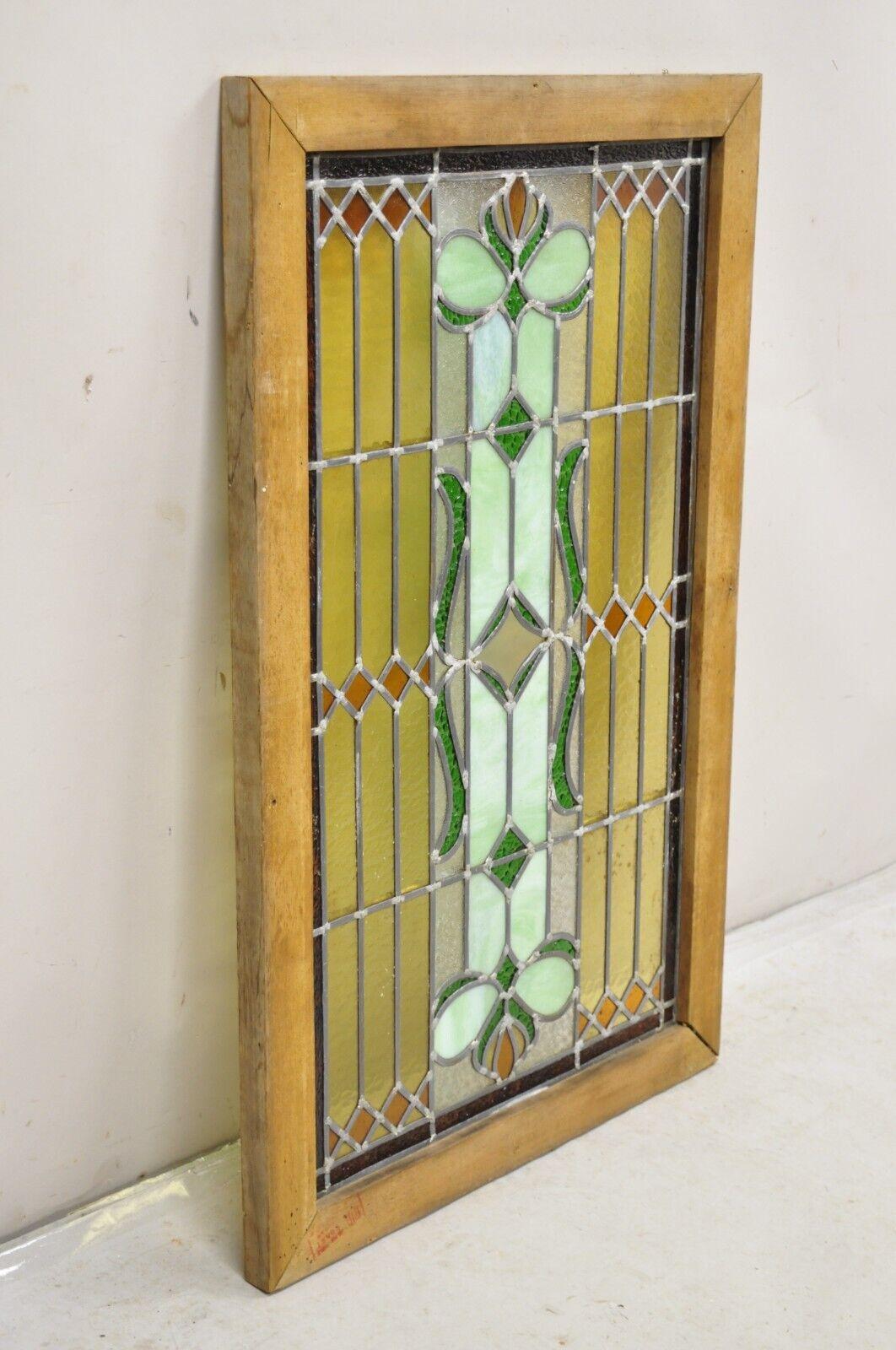 Antique Victorian Leaded Stained Glass Green Amber Tortoise Window in Wood Frame In Good Condition For Sale In Philadelphia, PA