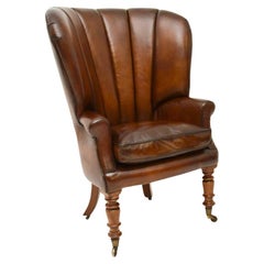 Fauteuil victorien ancien en cuir à dossier baril