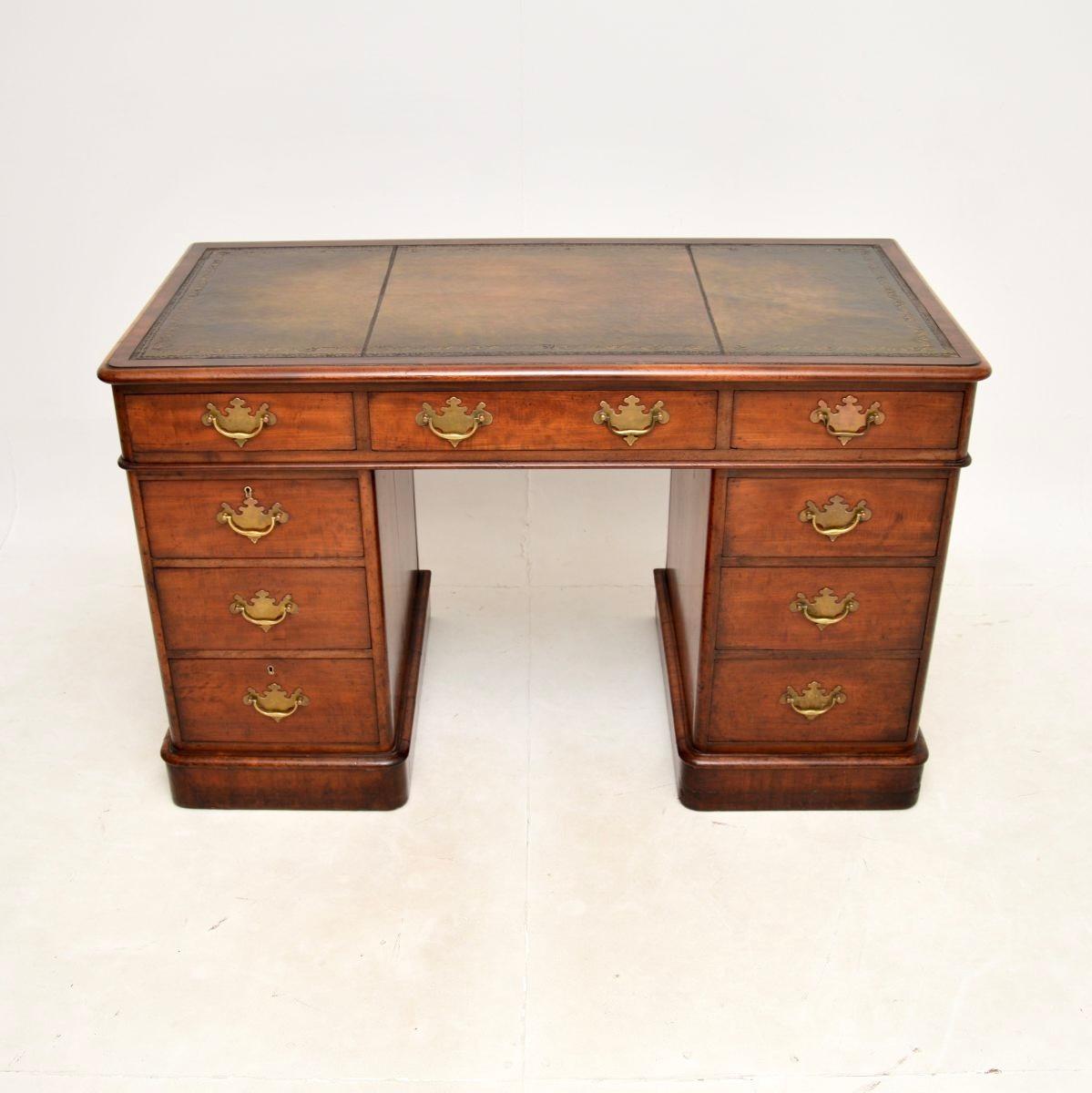 A smart and very useful antique Victorian  leather top pedestal desk. This was made in England, it dates from the 1860-1880 period.

This is of extremely fine quality, it was made by George & Co and has the makers mark stamped in the drawer. The
