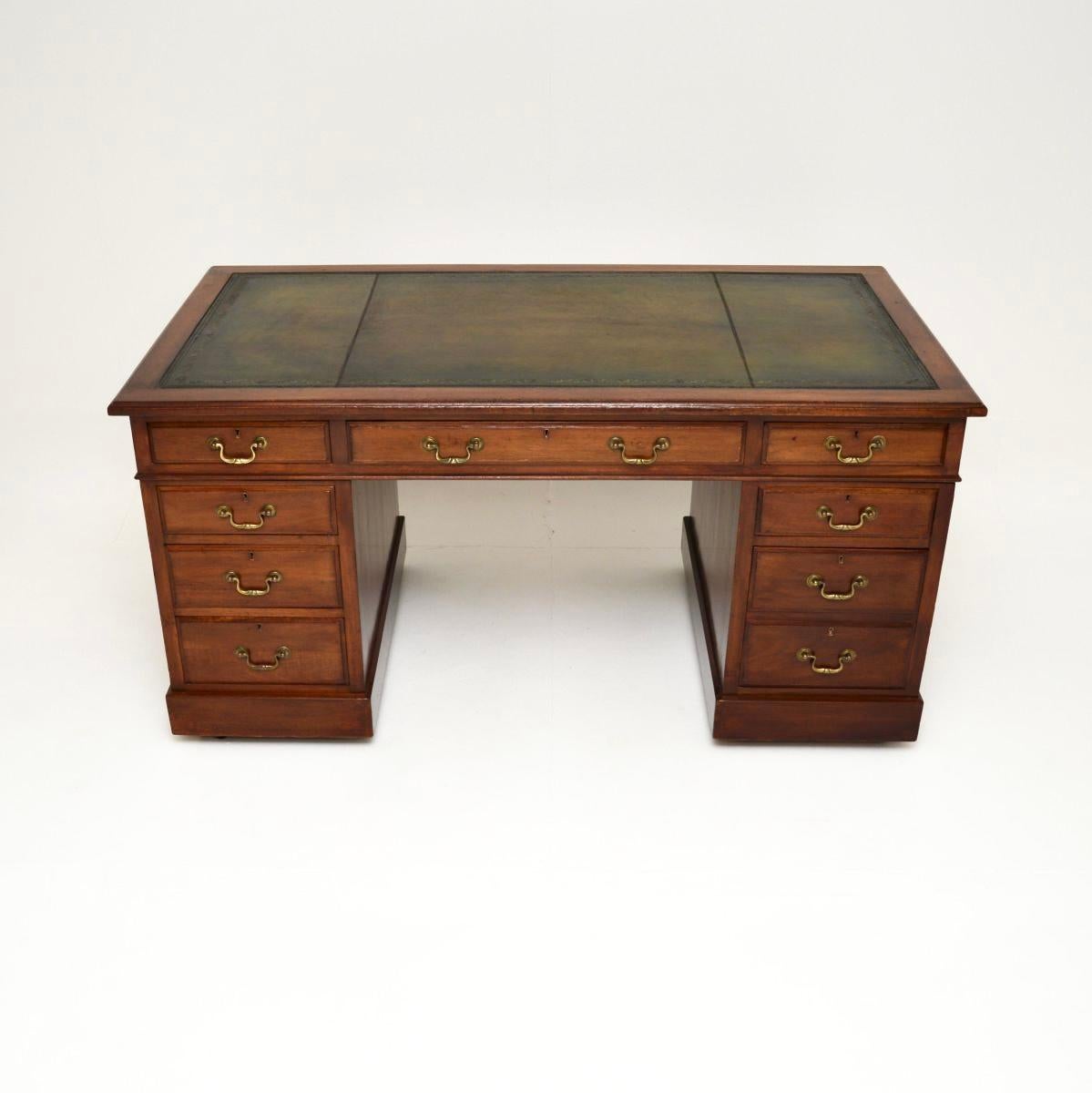 A very smart and well made antique Victorian leather top pedestal desk. This was made in England, it dates from around 1890-1900.

It is of lovely quality and is a useful size, with a generous kneehole space. There is an inset leather top which is