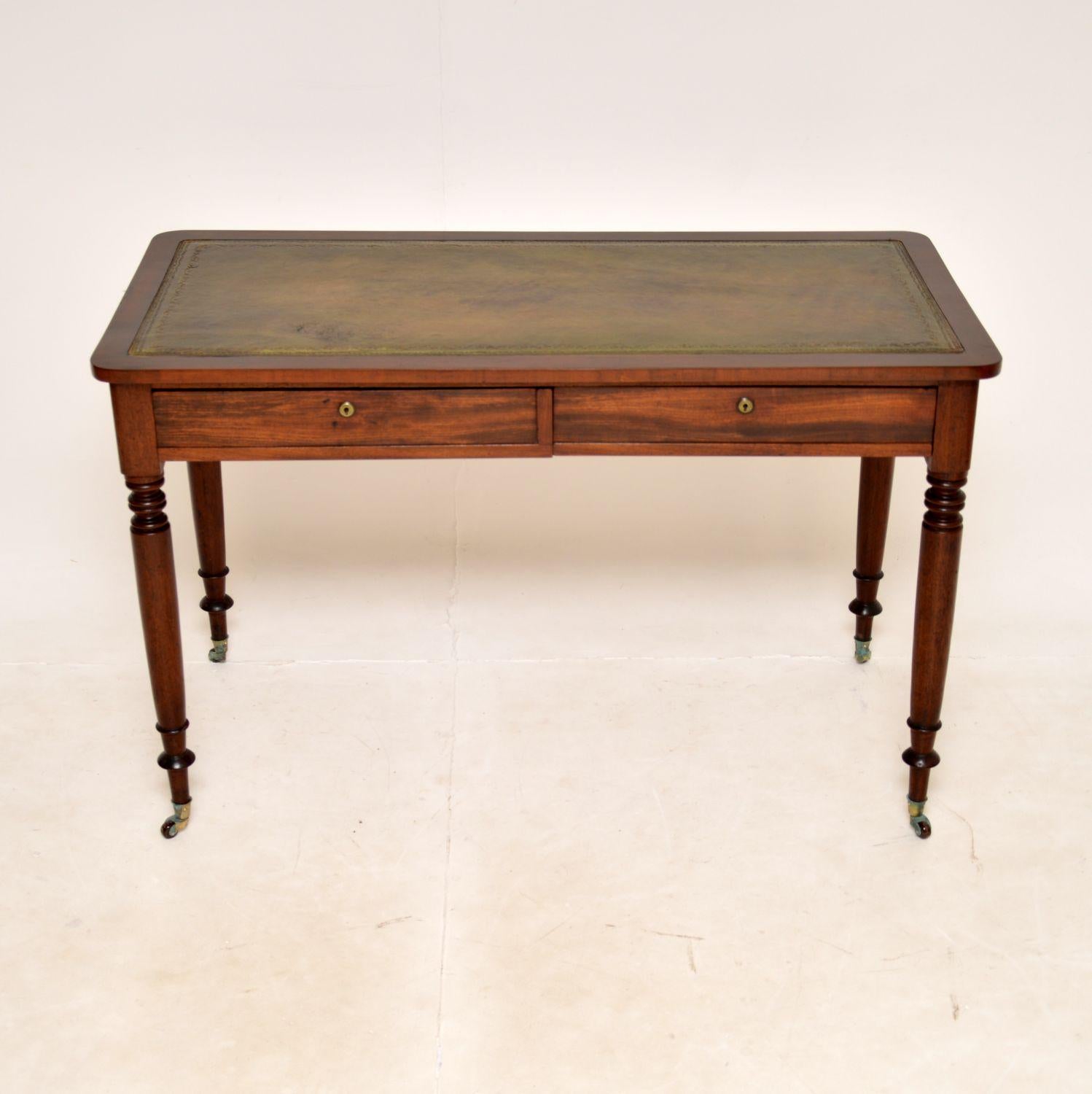 A very smart and well made antique writing table / desk. This was made in England, it dates from the 1840-1850 period.

It is of lovely quality and is a very useful size. The inset leather top is hand coloured with tooled edges, this has a nicely