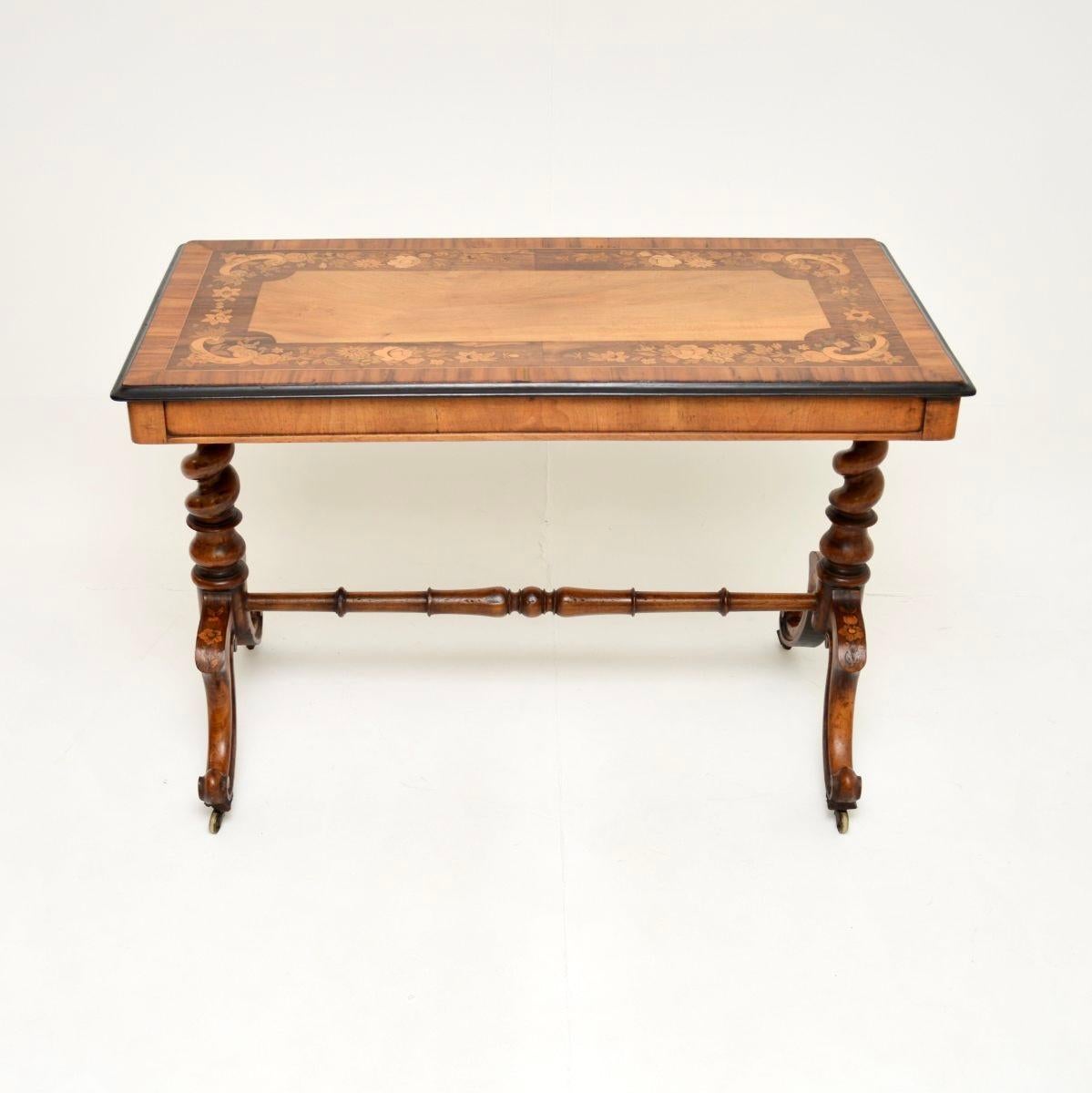 An absolutely stunning antique Victorian library table / desk. This was made in England, it dates from around the 1850-1870 period.

It is of outstanding quality, standing on gorgeous barley twist legs with a finely turned stretcher base. The top is