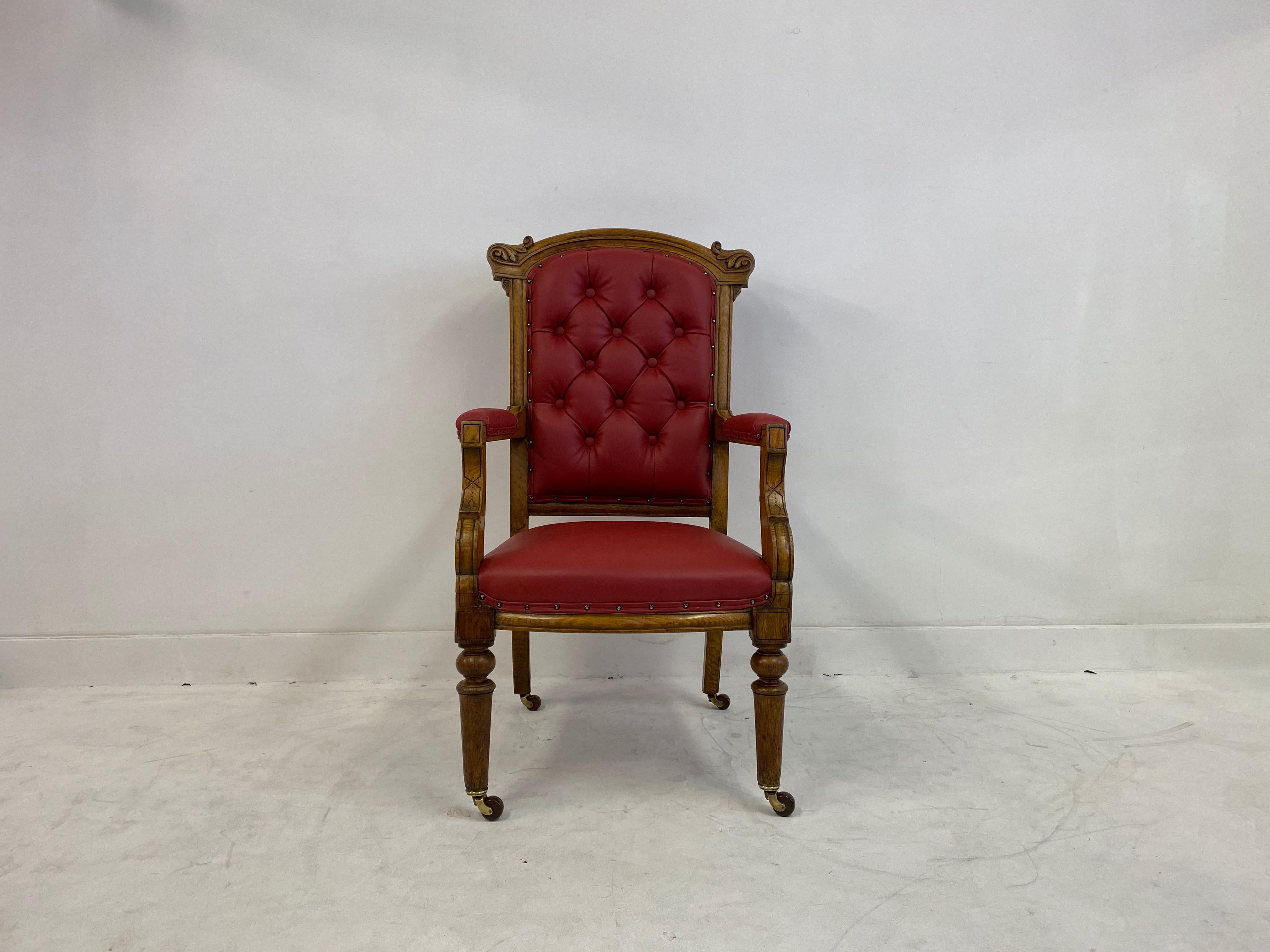 Throne armchair

Light oak

Red leather upholstery

On castors

Dated 1892

Measures: Seat height 44cm.