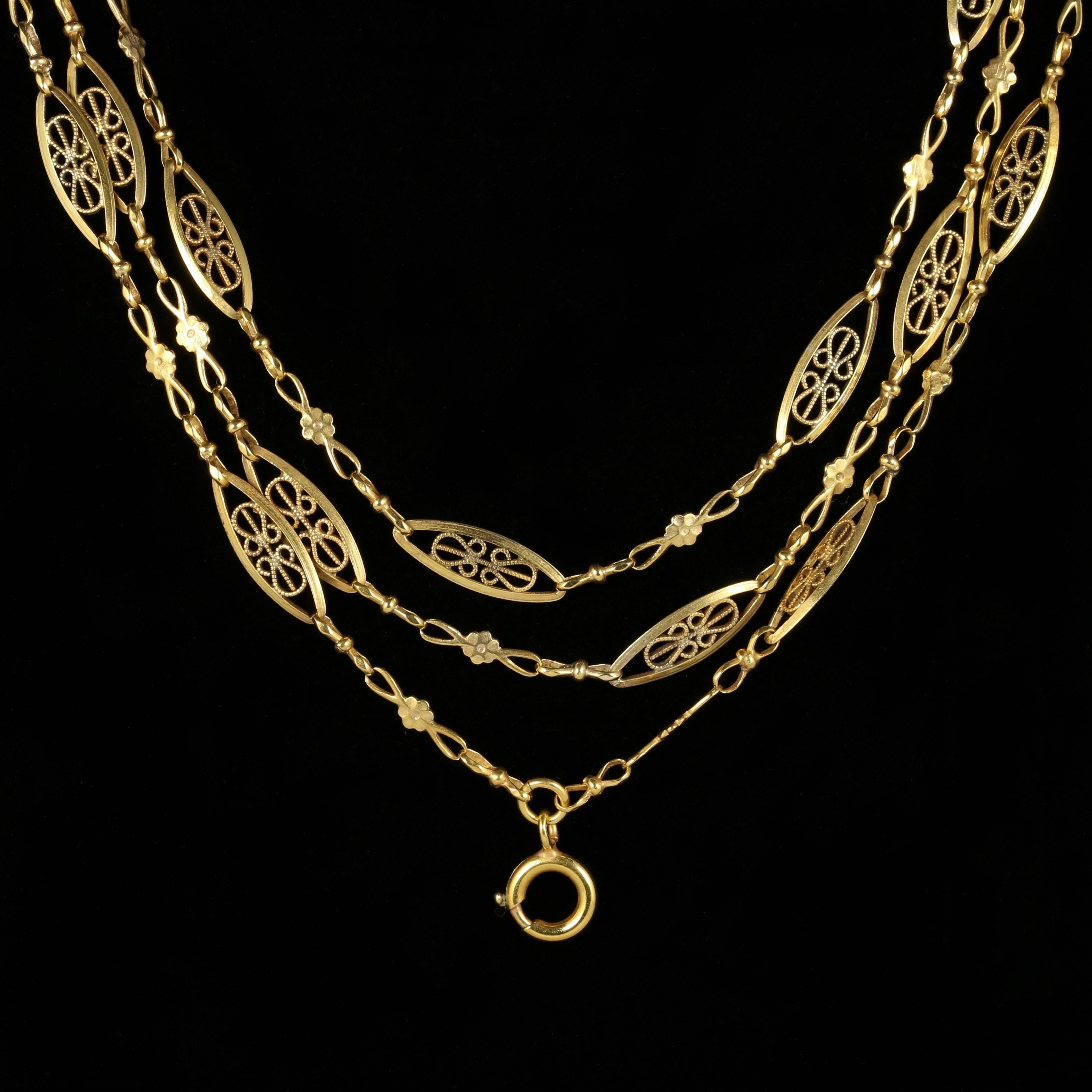 A fabulous long antique French sautoir chain set with lovely fancy panels and floral links set in 18ct Yellow Gold on Silver.

A Sautoir necklace is a French term for a long chain that runs down to the waist. They were popular in the 1900s and were