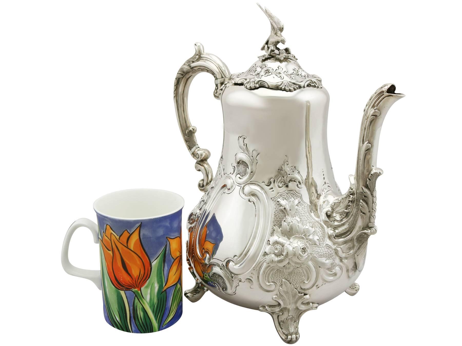 An exceptional, fine and impressive antique Victorian English sterling silver coffee pot in the Louis style; an addition to the silver tea ware collection

This exceptional antique Victorian sterling silver coffee pot has a baluster form in the