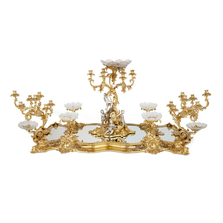 Antique Victorian Louis XIV style centrepiece by Barnard & Sons
English, 1850-53
Dimensions: height 63cm, width 132cm, depth 87cm.

This magnificent centrepiece is wrought from silver and silver-gilt and designed in the superb Louis XIV style by