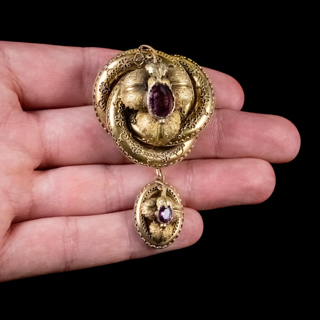 Women's Antique Victorian Lovers Knot Brooch Amethyst 15 Carat Gold Locket, circa 1880 For Sale