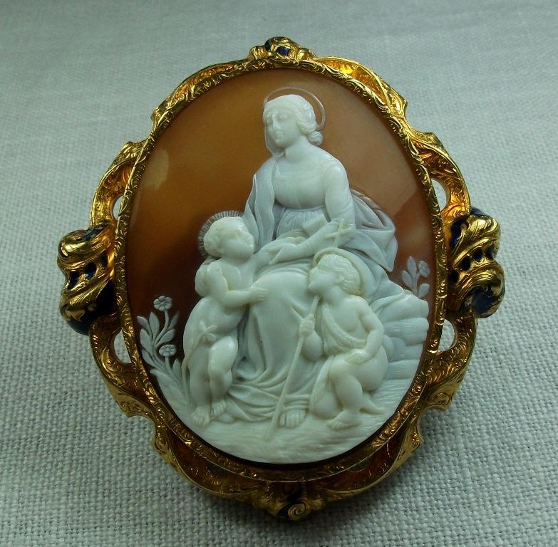 Museum Quality cameo depicting Madonna and Child and the little St. John. The cameo is after a painting by Raphael title 