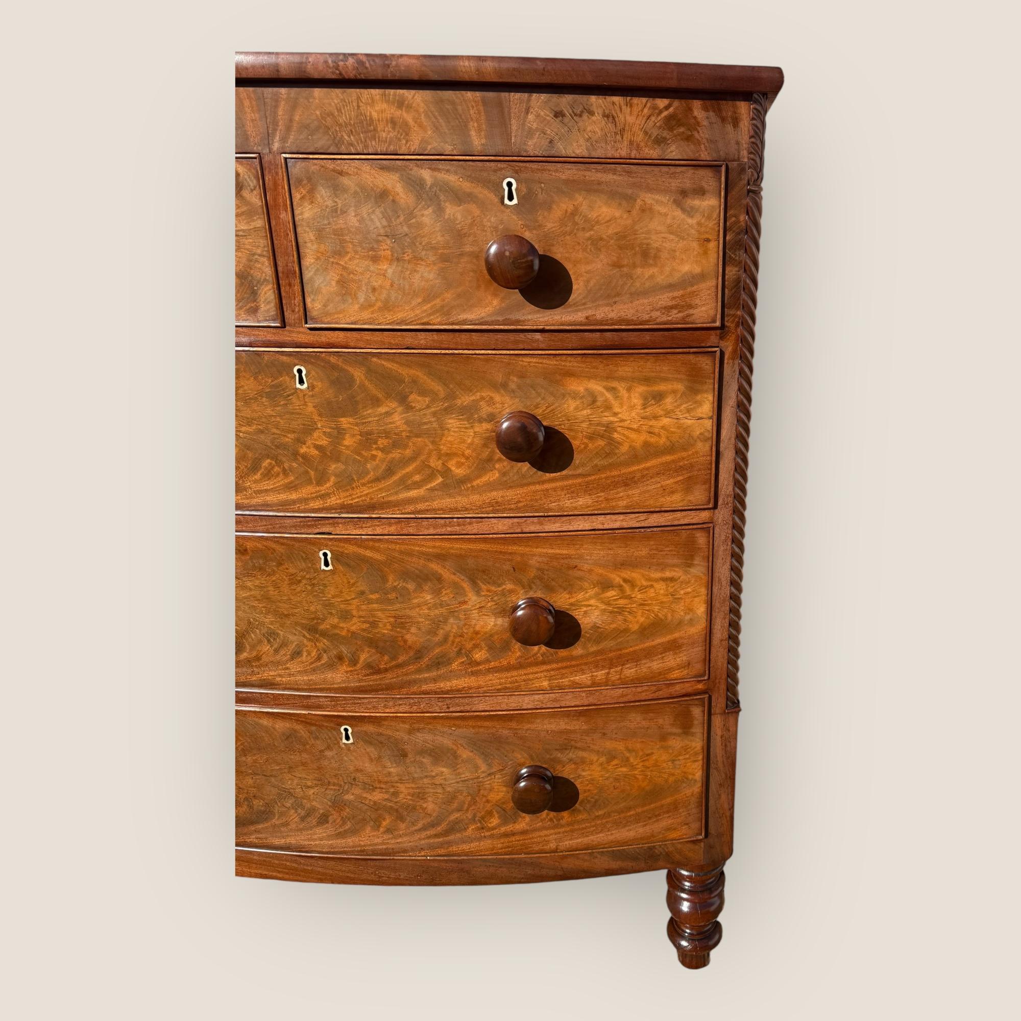 Carved Antique Victorian Mahogany Bow Front Chest of Drawers with Wooden Handles For Sale