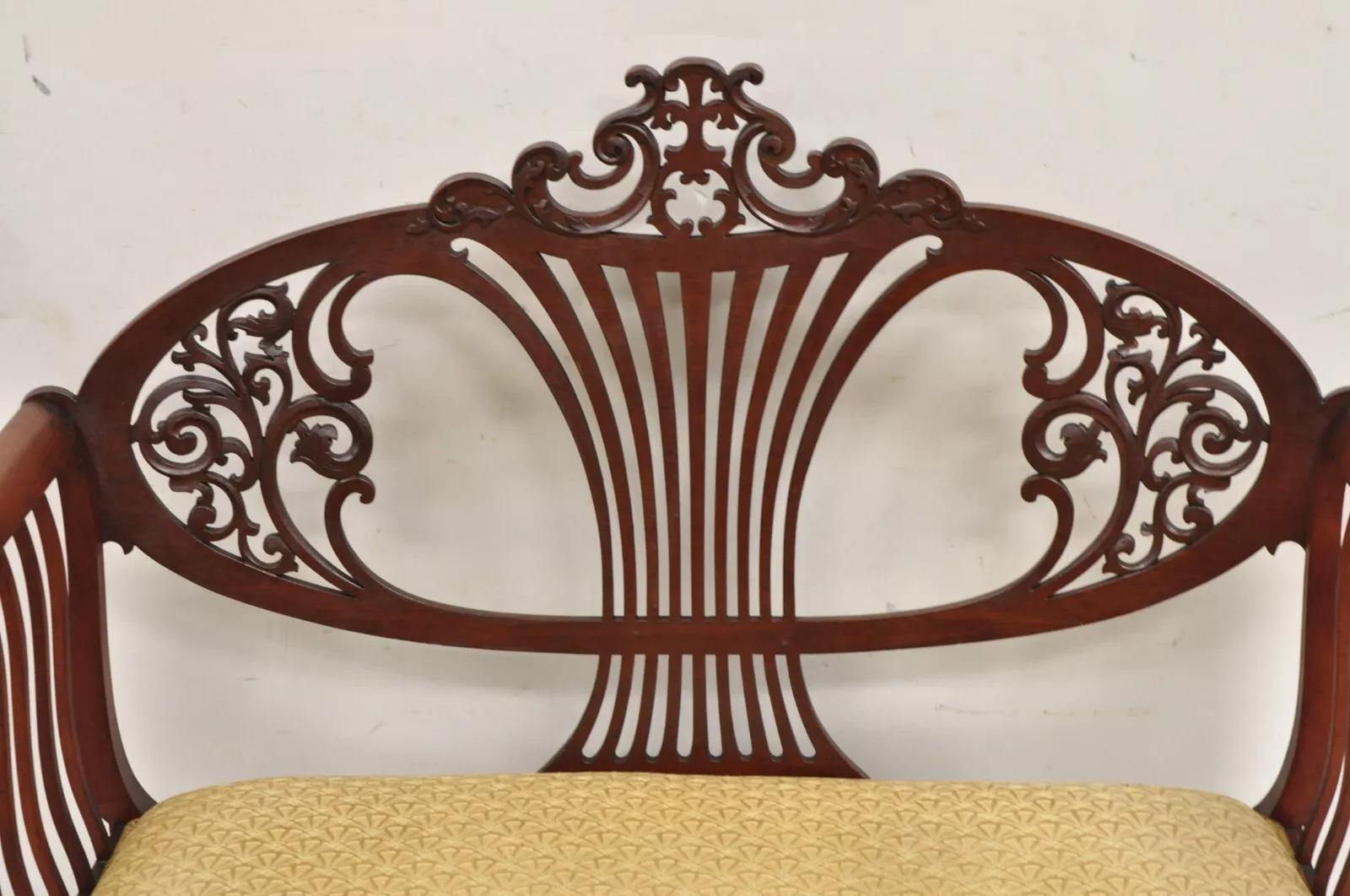 Antique Victorian Mahogany Carve Fretwork Sofa Parlor Bench Settee Loveseat. Circa Early 20th Century. Measurements: 36.5
