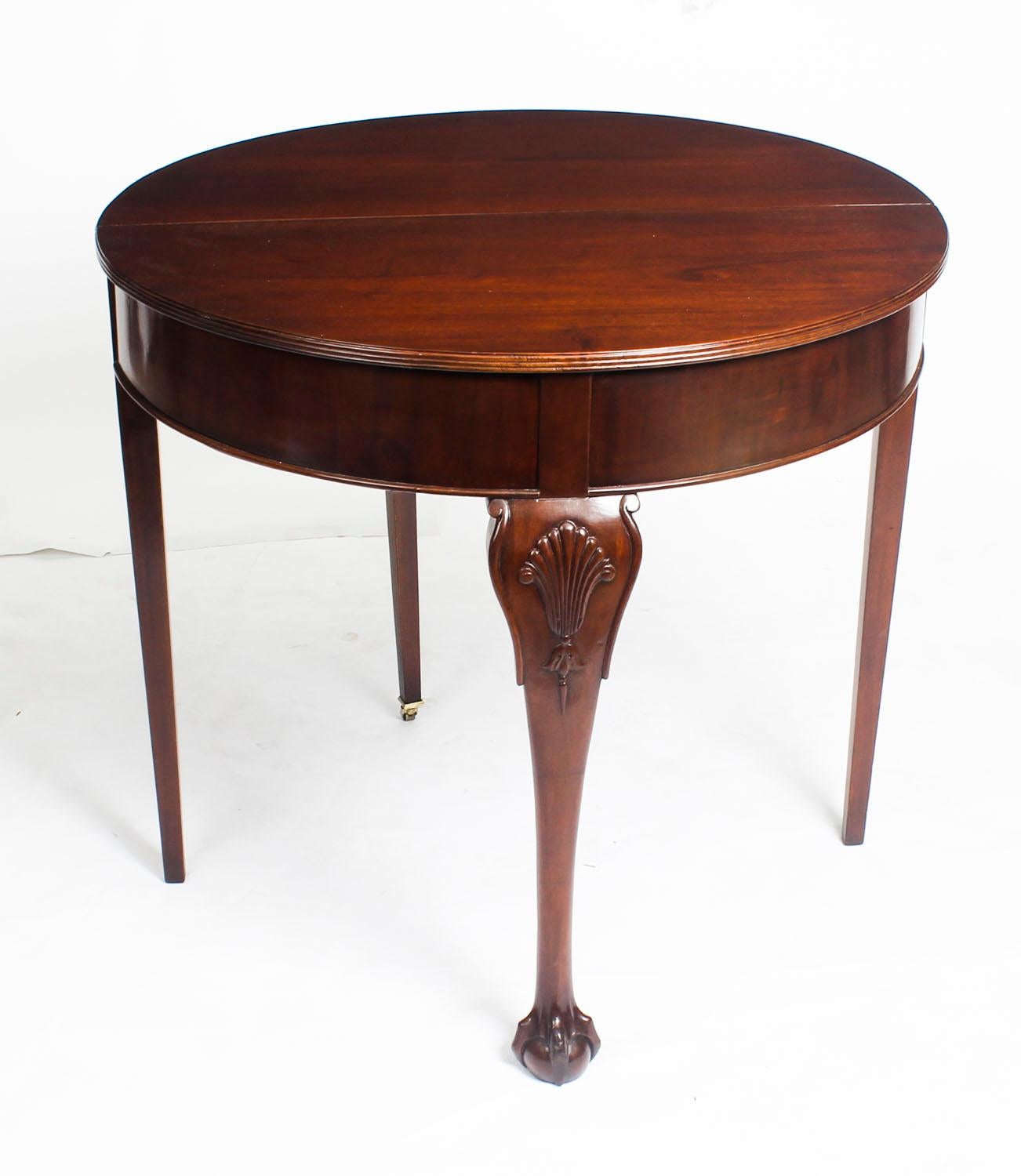 This is a beautiful antique Victorian mahogany demi lune side table, 19th century in date.

The table is made of solid mahogany with a moulded top above a plain frieze and is raised on a central cabriole leg and three square tapering legs. The
