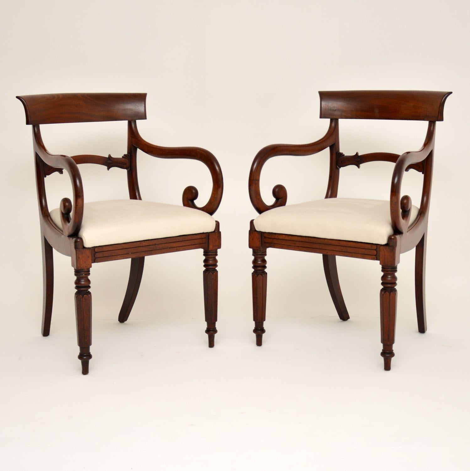 Set of six William IV mahogany dining chairs dating from the 1830s-1840s period & in excellent condition. There are two carvers & four chairs. The drop in seats have just been re-upholstered in a cream linen fabric. These chairs have Trafalgar backs