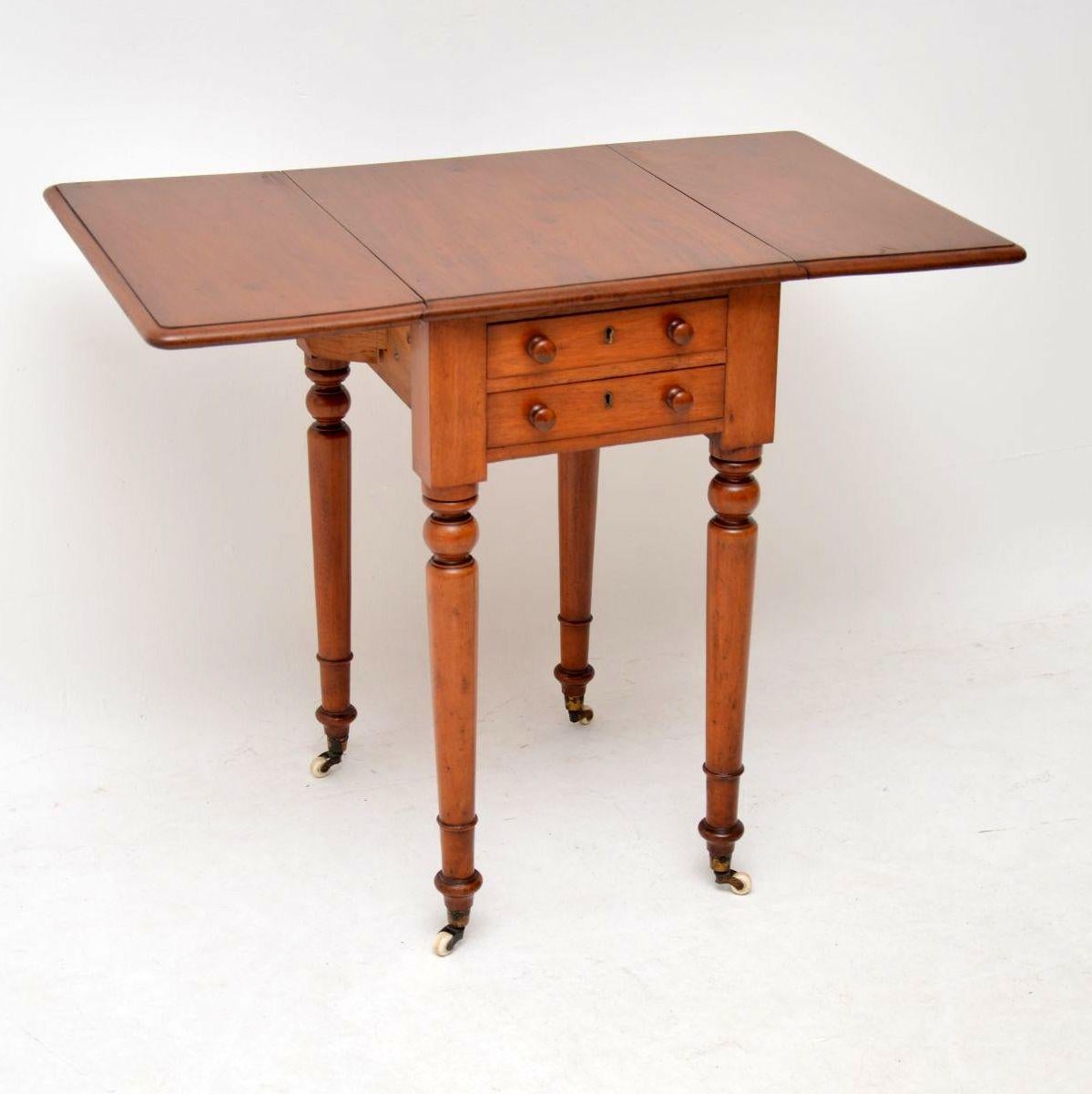 Small antique early Victorian mahogany drop leaf table dating from the 1860s period. It’s in very good original condition and is solid mahogany. There are two drawers, with fine dovetails, original handles and locks. The back is polished too and it