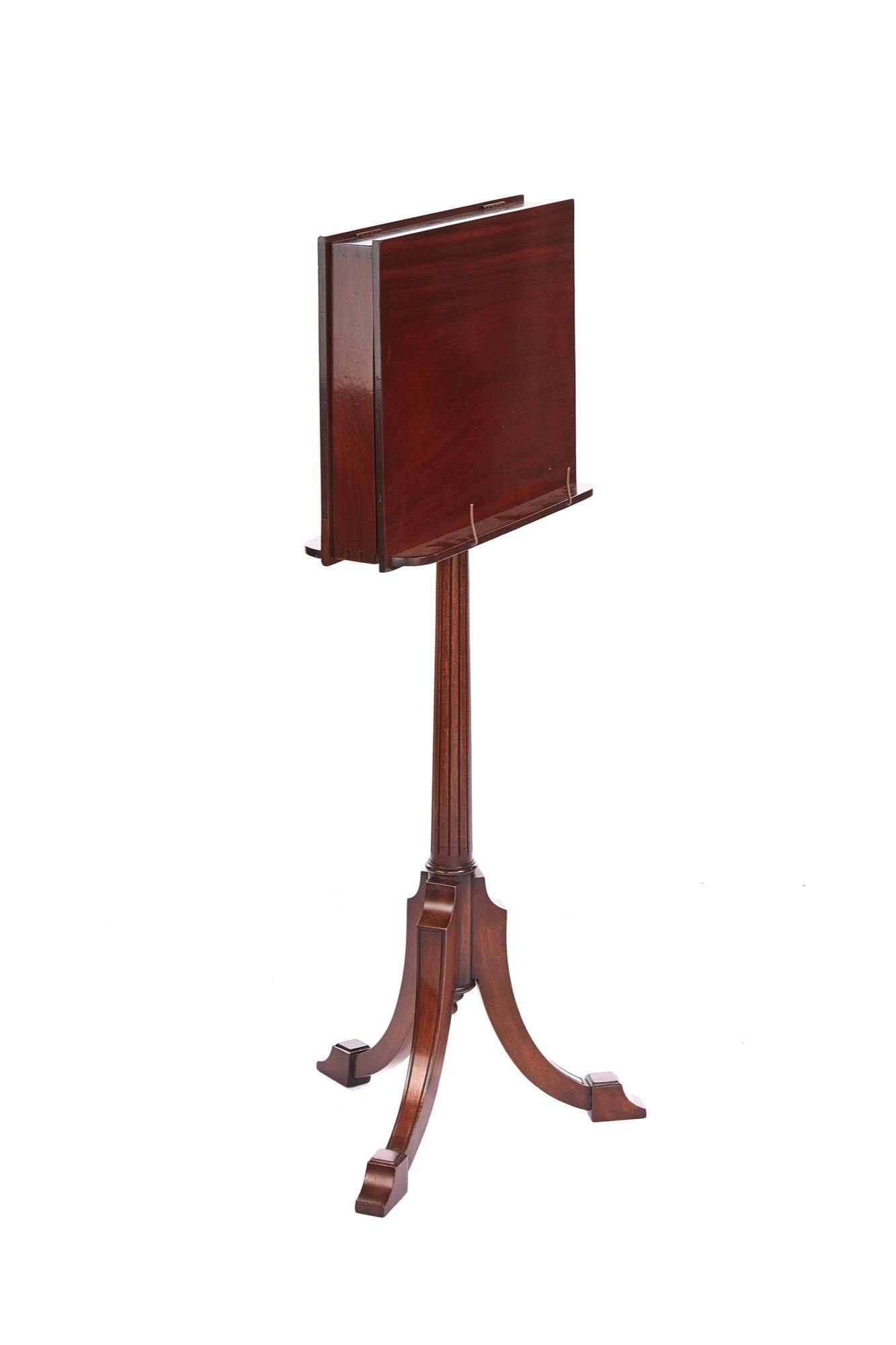 Antique Victorian Mahogany duet stand having two adjustable mahogany ratchet rests either side supported by original brass telescopic pole standing on a lovely carved mahogany tripod base. Lovely color and condition. 
H: 110cm - 135cm