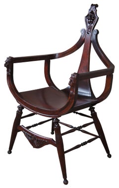 Antique Victorian Mahogany Figural Lion Head Carved Curule Saddle Seat Arm Chair