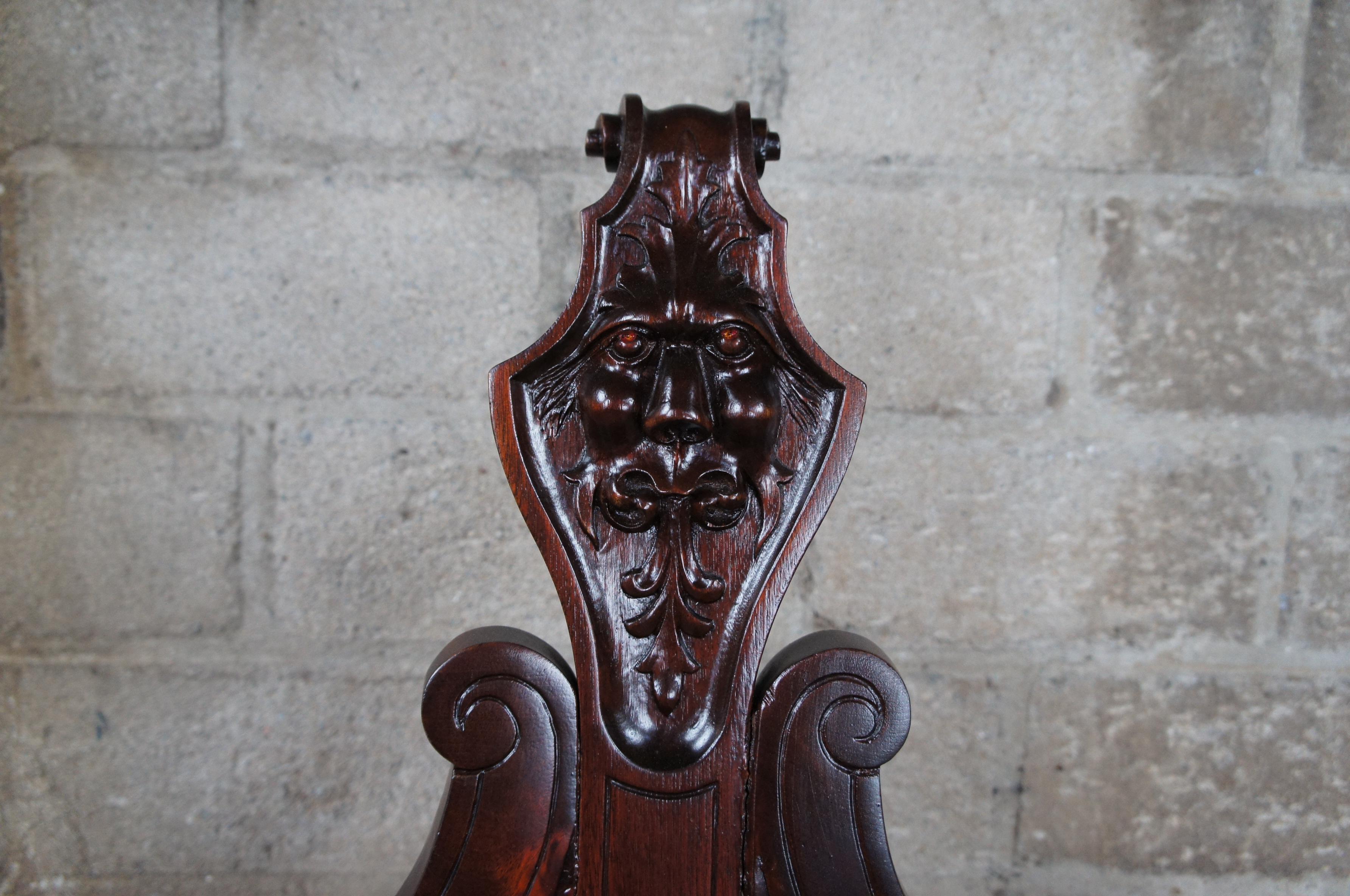 Late Victorian Antique Victorian Mahogany Figural Lion Head Carved Curule Saddle Seat Arm Chair For Sale