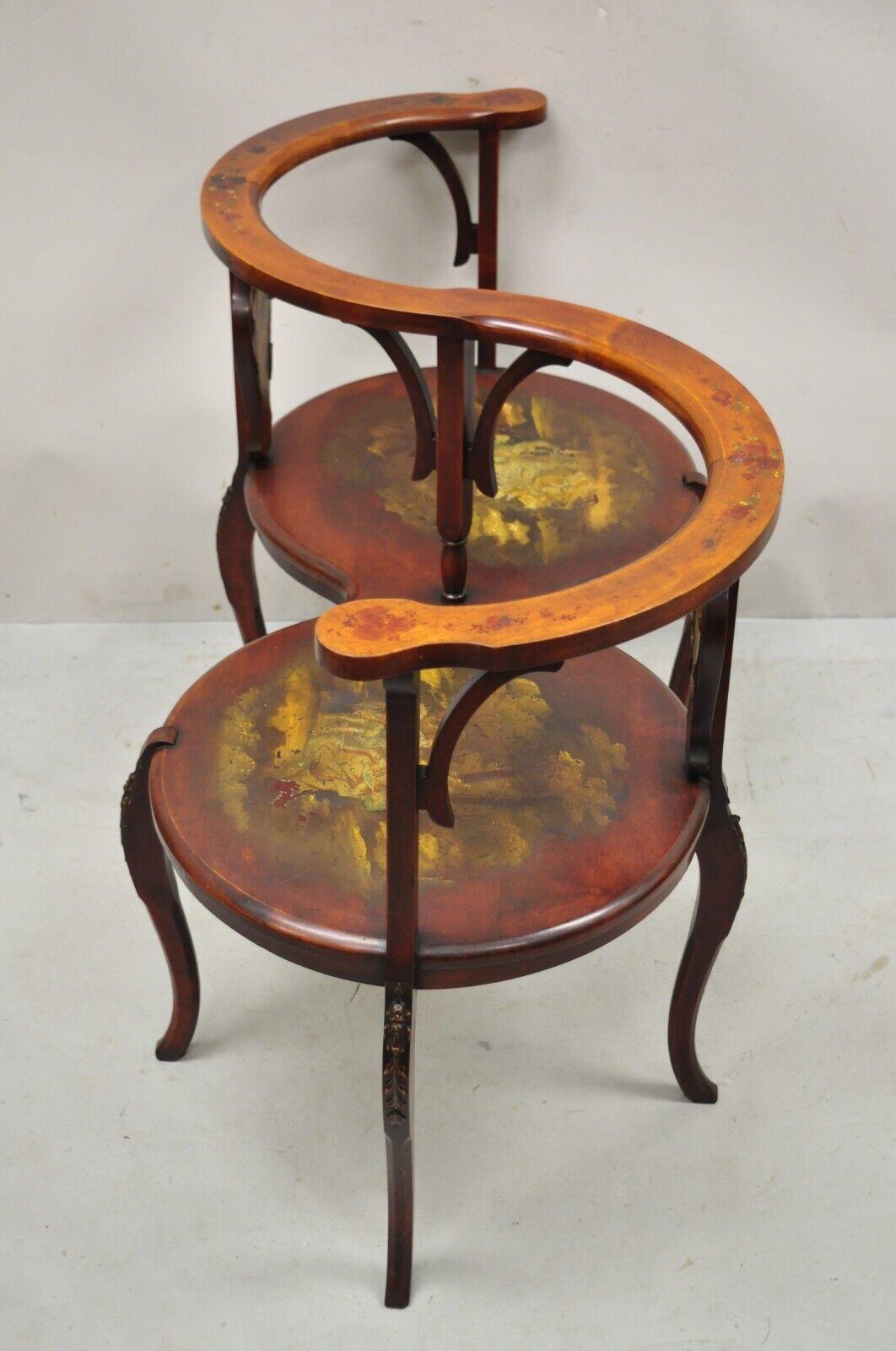 Antique Victorian Mahogany hand painted Tete a Tete 2 seat bench. Item features hand painted scenes, twin seats, applied carvings, cabriole legs, very nice antique item, great style and form. Circa 1900. Measurements: 28.5