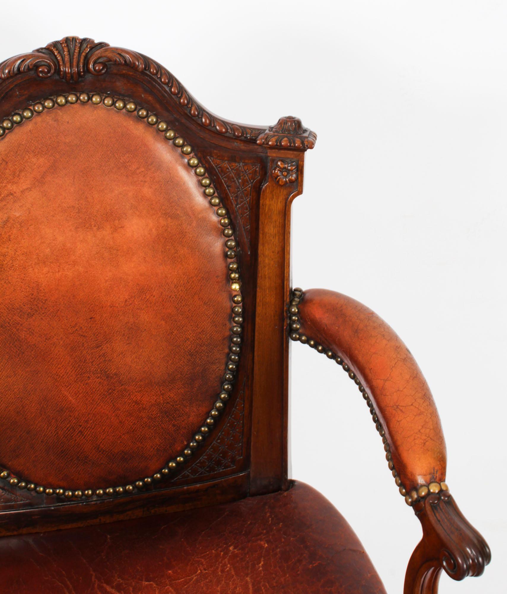 Antiker viktorianischer Sessel aus Mahagoni und Leder aus dem 19. Jahrhundert (Geschnitzt) im Angebot