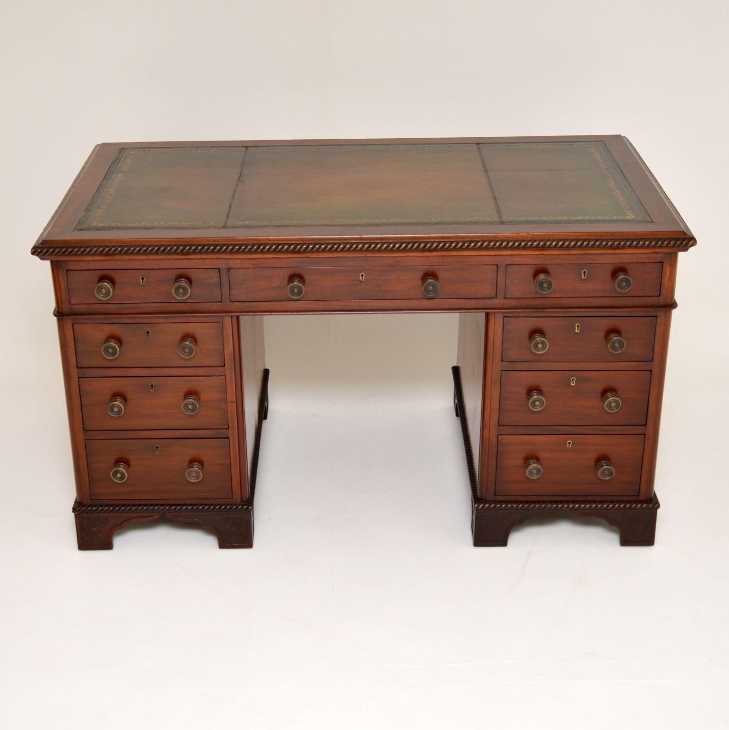 This generously proportioned antique desk with plenty of working space is of extremely high quality & is in very good original condition. It’s solid mahogany, dating roughly to circa 1860s-1980s period & has some fine features. The tooled leather