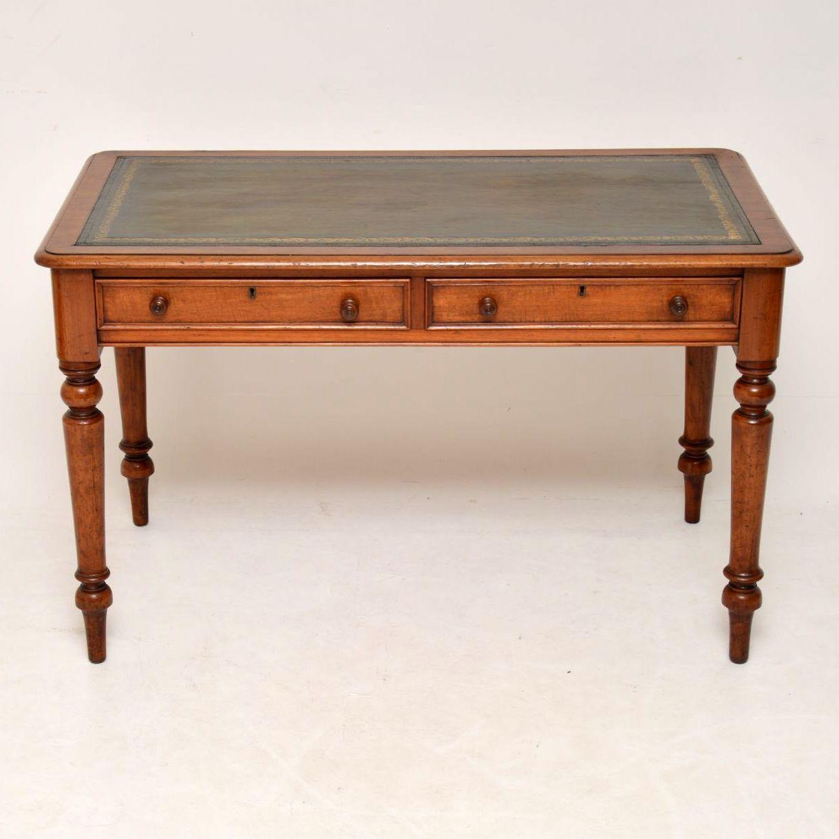 Antique Victorian mahogany desk with a tooled leather writing surface and all in good condition. It has a polished back, two drawers with turned mahogany handles, original locks and sits on boldly turned legs. This desk is a decent size with plenty
