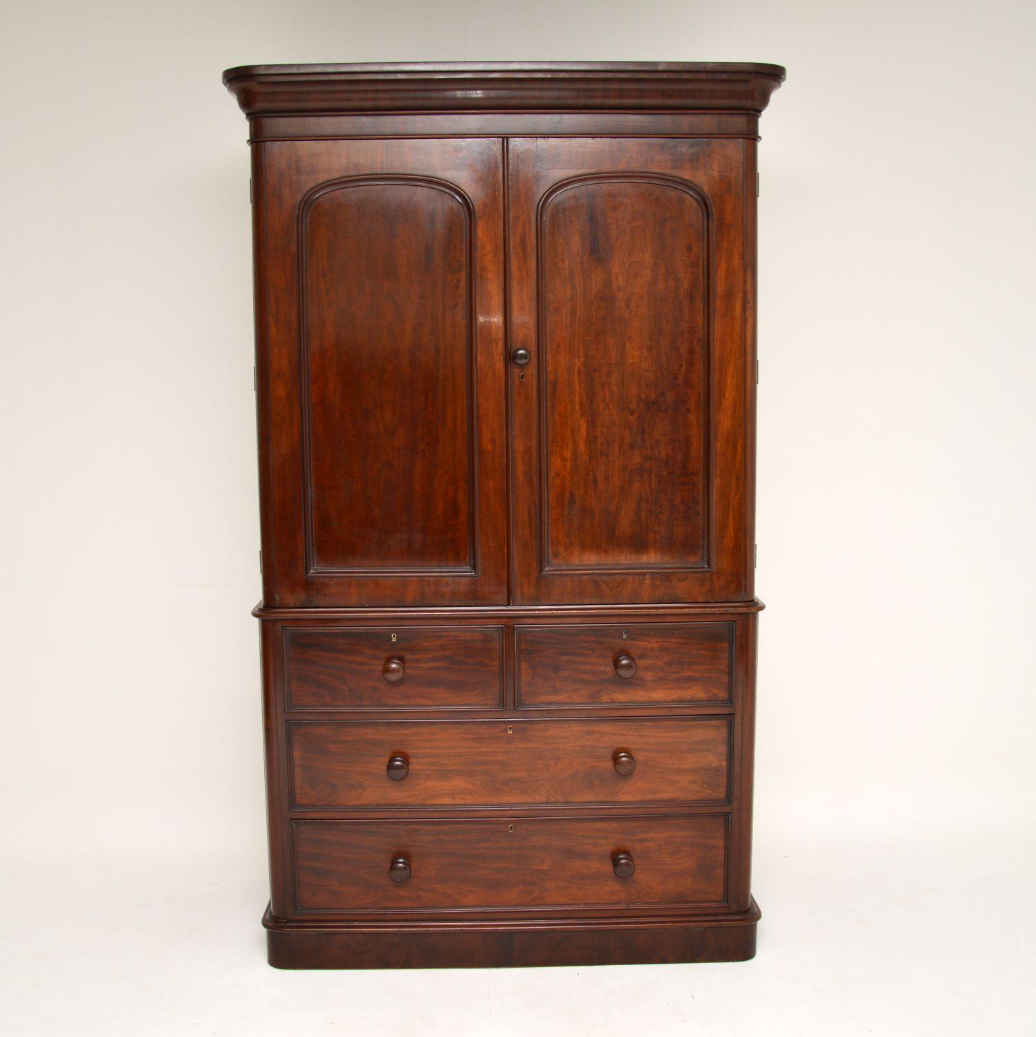 A top quality antique Victorian linen press, beautifully made from mahogany. This dates from circa 1860-1880 period.

It is really well made, with a nicely moulded cornice and base. This has tons of storage space, with four deep lower drawers and