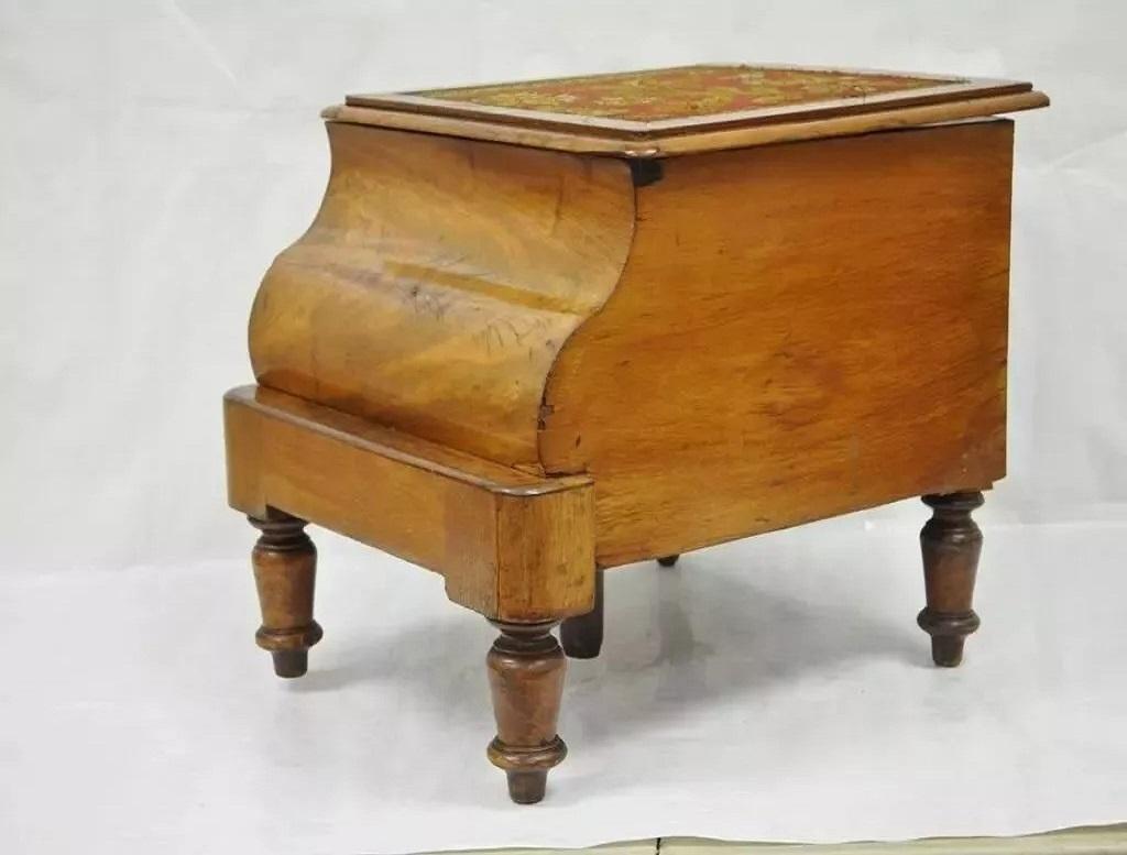 Antique Victorian Mahogany & Needlepoint Chamber Pot Commode Bedside Step Stool. Item featured has a porcelain chamber pot and lid on turned legs Circa 19th Century. Probably English. Measurements: 15.5