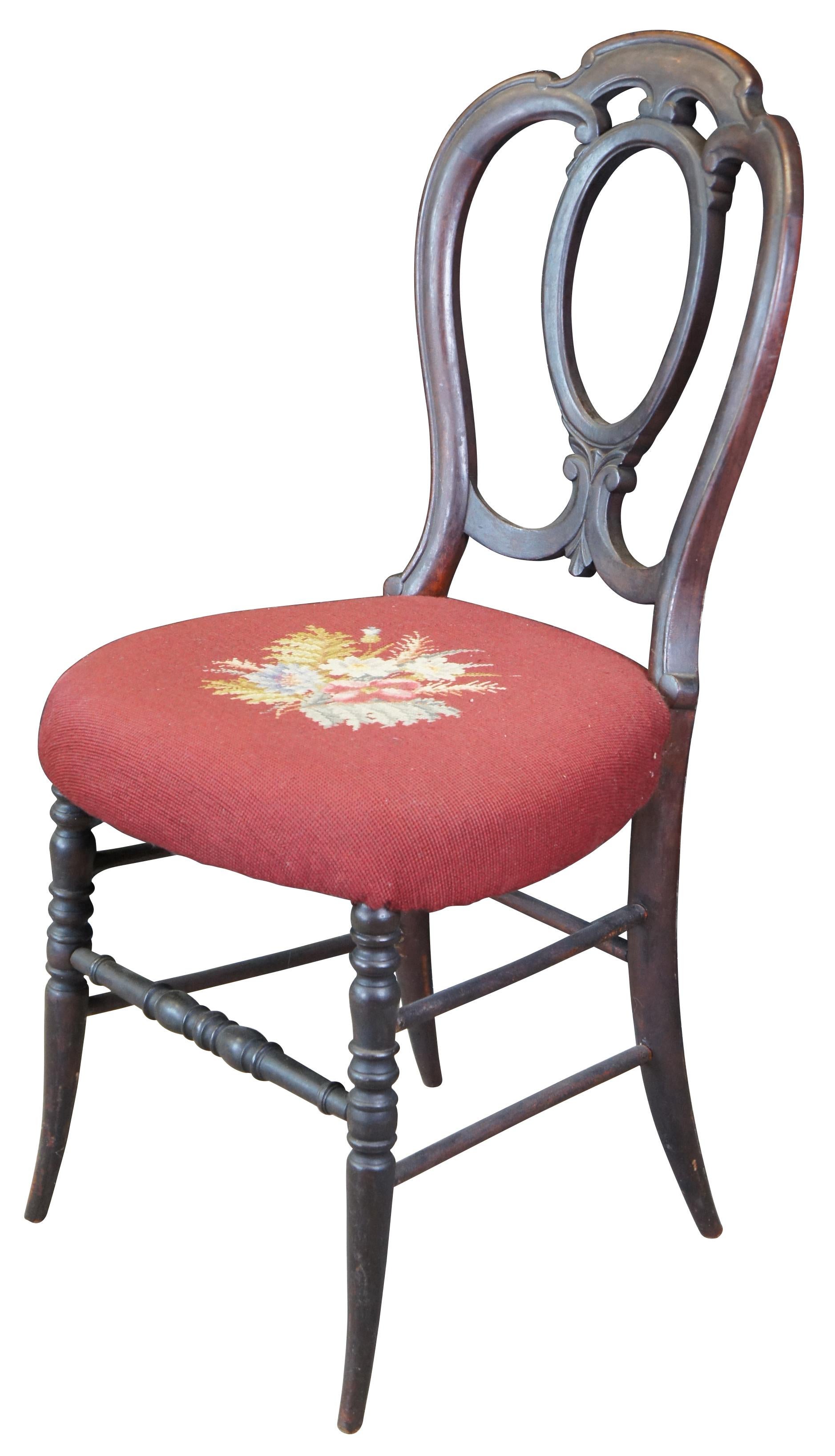 Antique 19th century balloon back chair. Made of mahogany featuring serpentine form with balloon shaped back, needlepoint seat and turned accents.
     