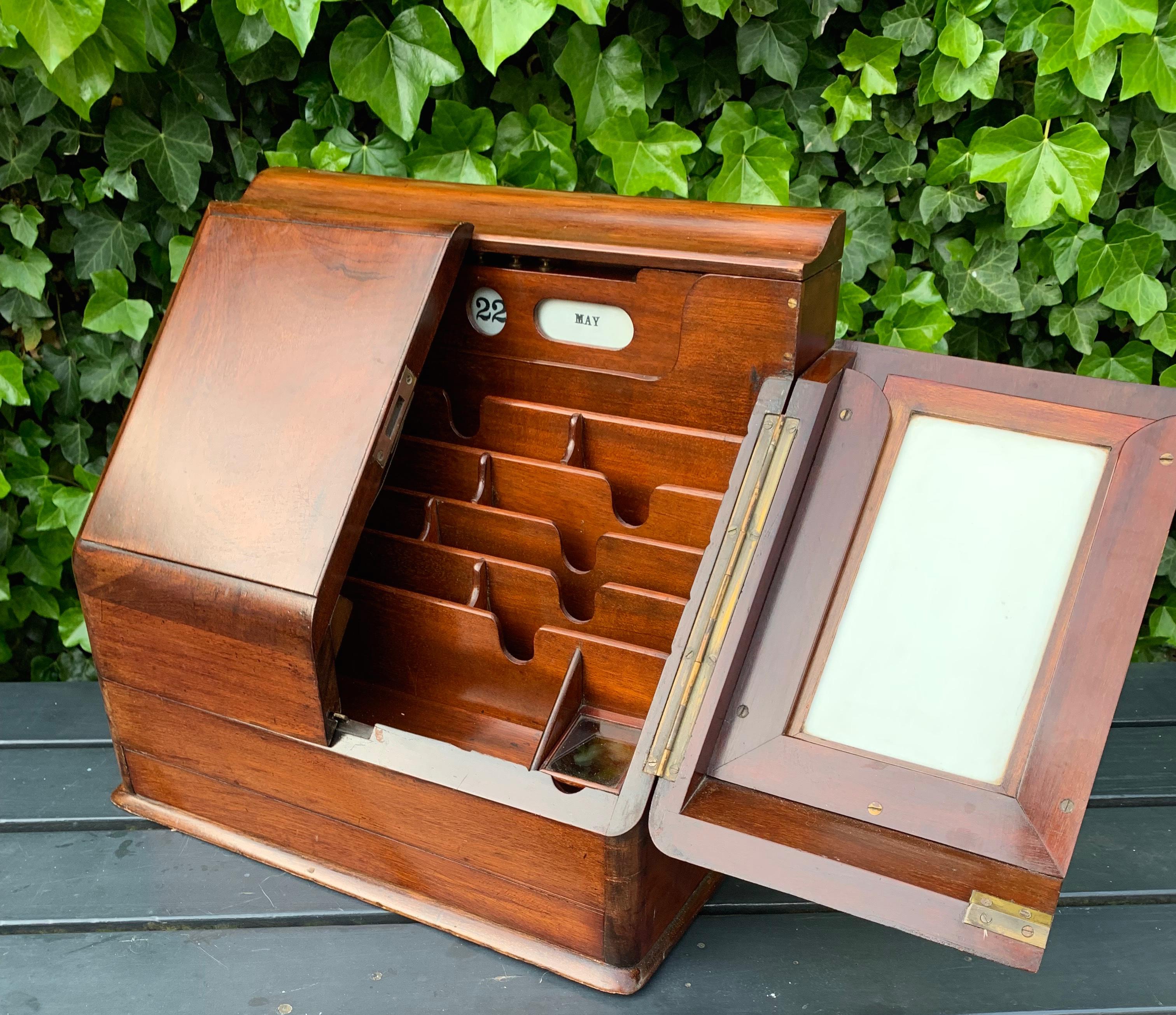 Stylish and mint condition, antique desk or table piece.

This rare and beautifully crafted Victorian luxury letter box is a true testament to 19th-century craftsmanship and ingenuity. Made from rich, solid wood with a deep, warm patina, it blends