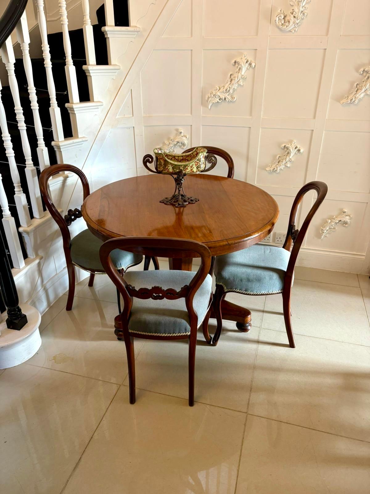A fine quality mid-19th century Victorian mahogany tilt-top dining / centre table. The circular solid mahogany top displays a rich, warm colour and lovely grain supported by a tapered octagonal column rising from a boldly shaped tri-form base with