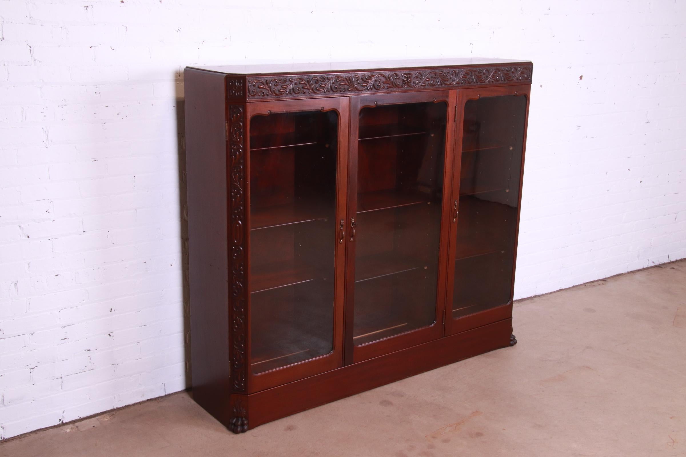 20th Century Antique Victorian Mahogany Triple Bookcase with Old Man of the North Carving