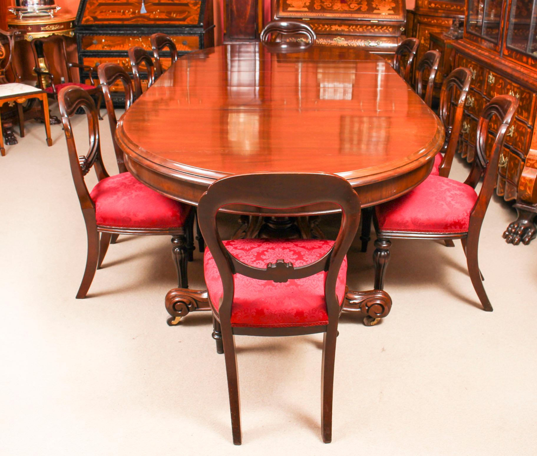 A fantastic antique Victorian dining set comprising an antique Victorian mahogany twin pedestal base dining table Circa 1865 in date and ten antique Victorian dining chairs, circa 1850 in date.
 
The oval shaped table is made from solid mahogany