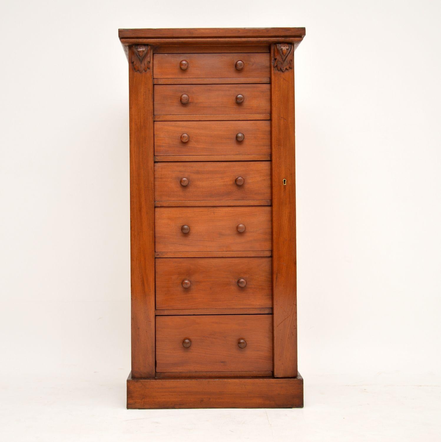 Antique Victorian mahogany Wellington chest of drawers in excellent condition and dating from the 1870s-1980s period. Wellington chests always have seven drawers and a hinged bar on one side that locks them all into place. The drawers are all