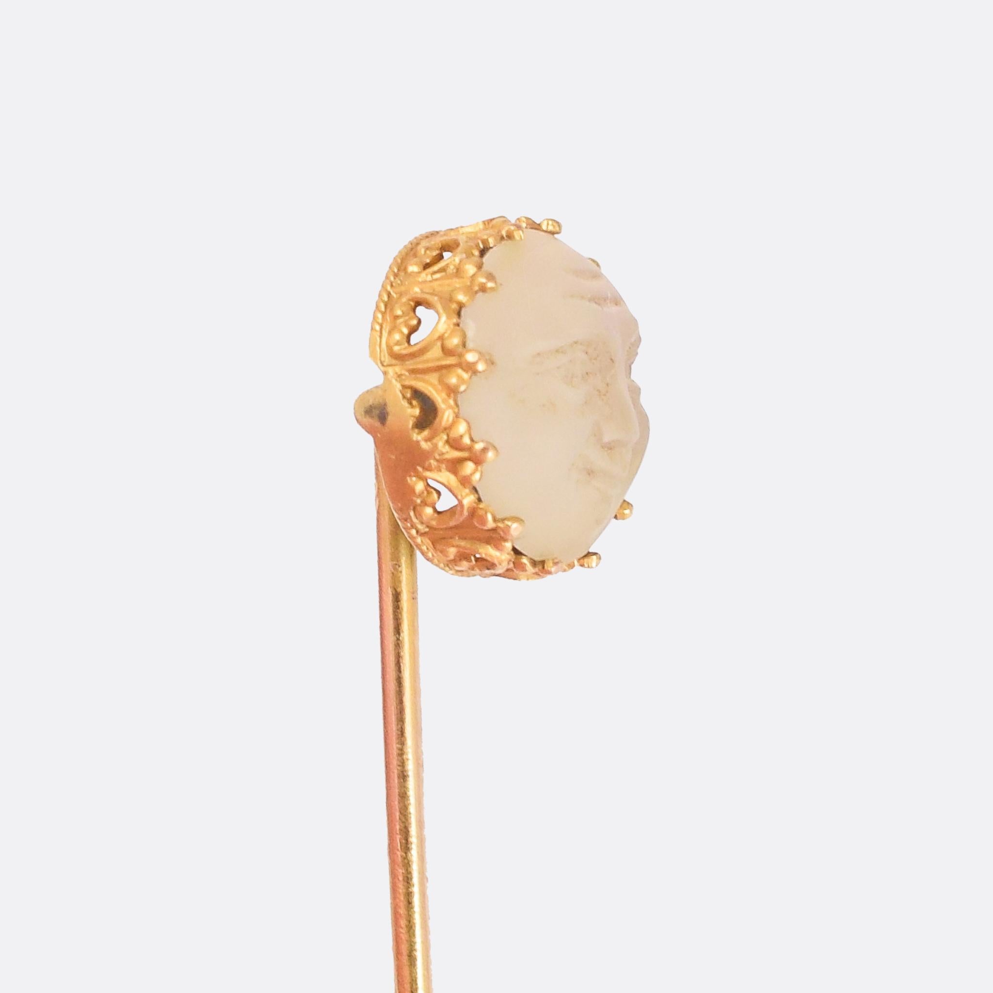 A gorgeous Man In The Moon pin dating from the late Victorian era. The moonstone displays shimmering multi-coloured adularescence, and has been carved with a face. The mount is beautifully detailed, crafted in 15 karat gold.

STONES