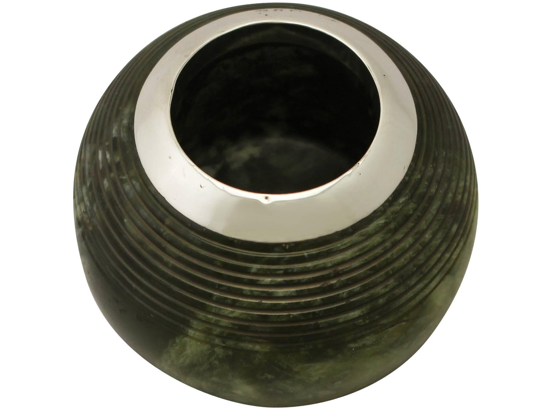 A fine and impressive antique Victorian English sterling silver and marble match striker, an addition to our ornamental collection.

This impressive antique Victorian sterling and marble match striker has a globular form.

The surface of the