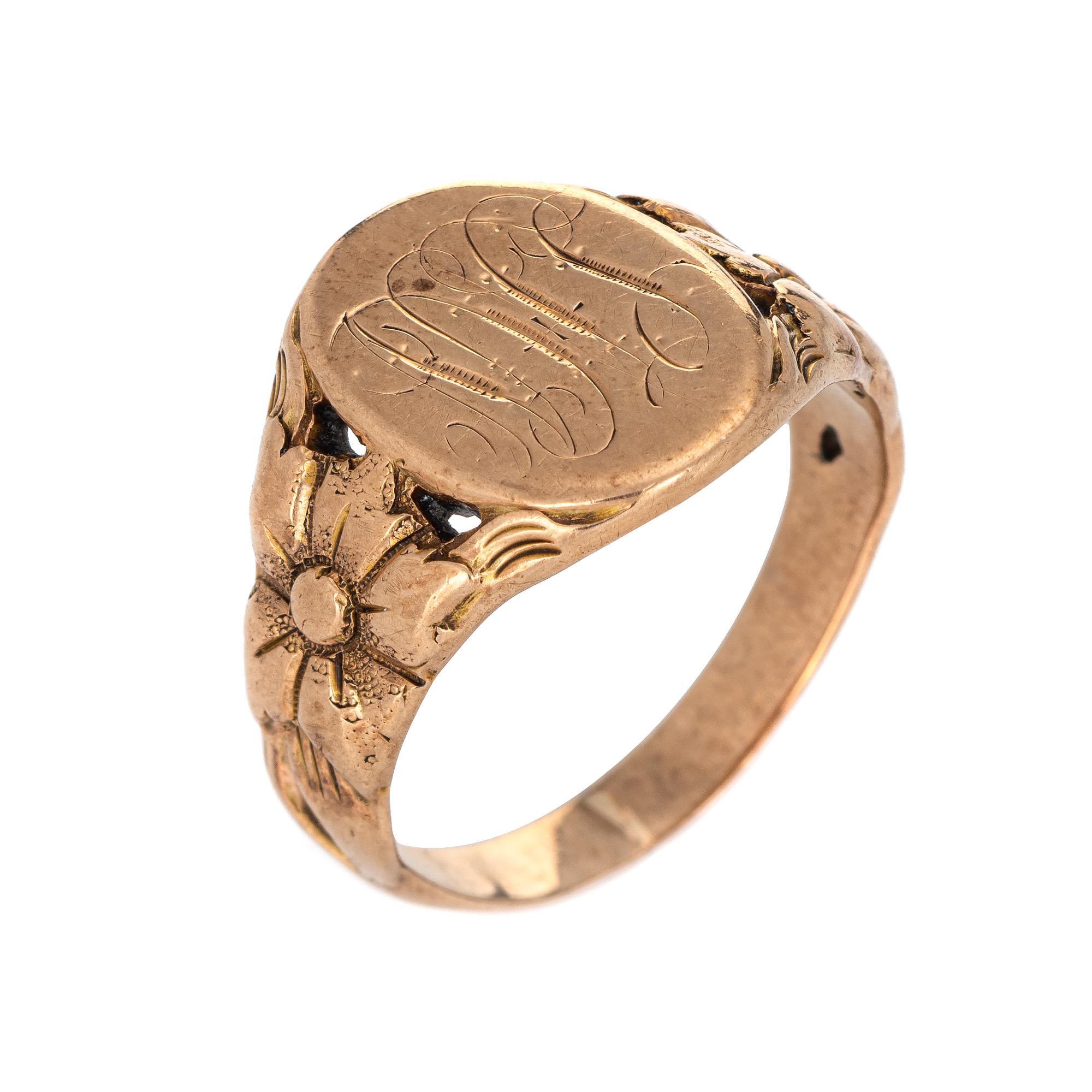 Finely detailed antique Victorian signet ring (circa 1880s to 1900s), crafted in 10 karat rose gold. 

From what we can decipher the center oval is inscribed with the initials 