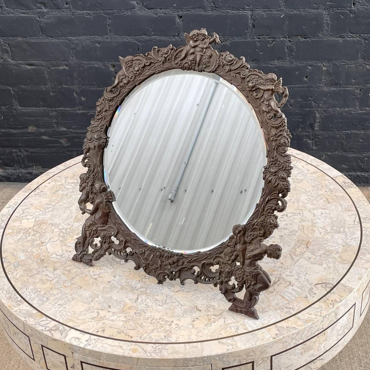 Antique Victorian Metal Vanity or Wall Mirror with Cherub Details

Country: United States
Materials: Silver Metal
Condition: Original Vintage Condition
Style: Victorian
Year: 1920s

$1,100

Dimensions:
16”H x 14”W x 1”D.
