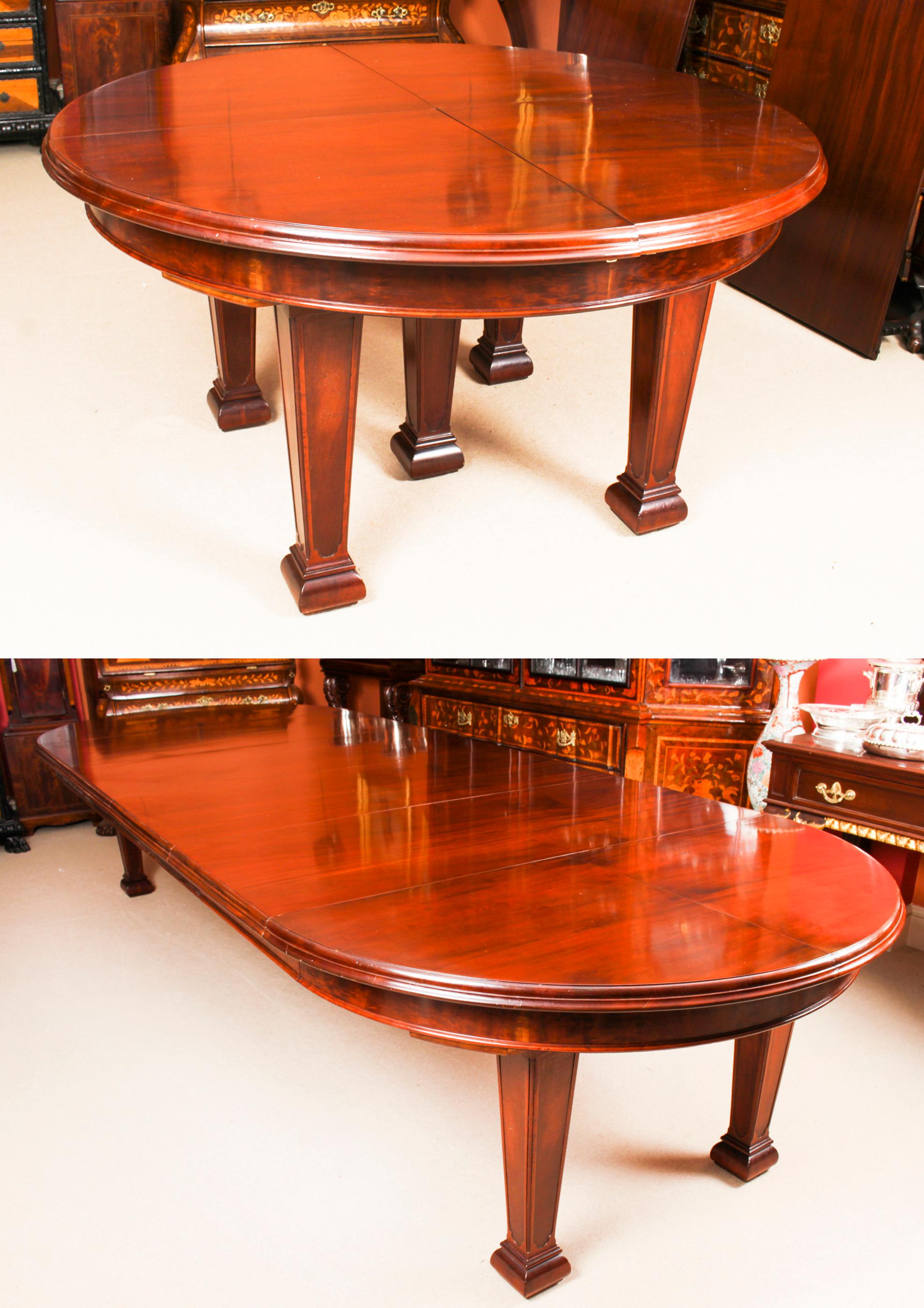 This is a rare large antique Victorian metamorphic flame mahogany circular extending dining table with two sets of leaves in the manner of Johnstone, Jupe and Jeanes, and dating from Circa 1870.

The circular top is quartered and extends by a