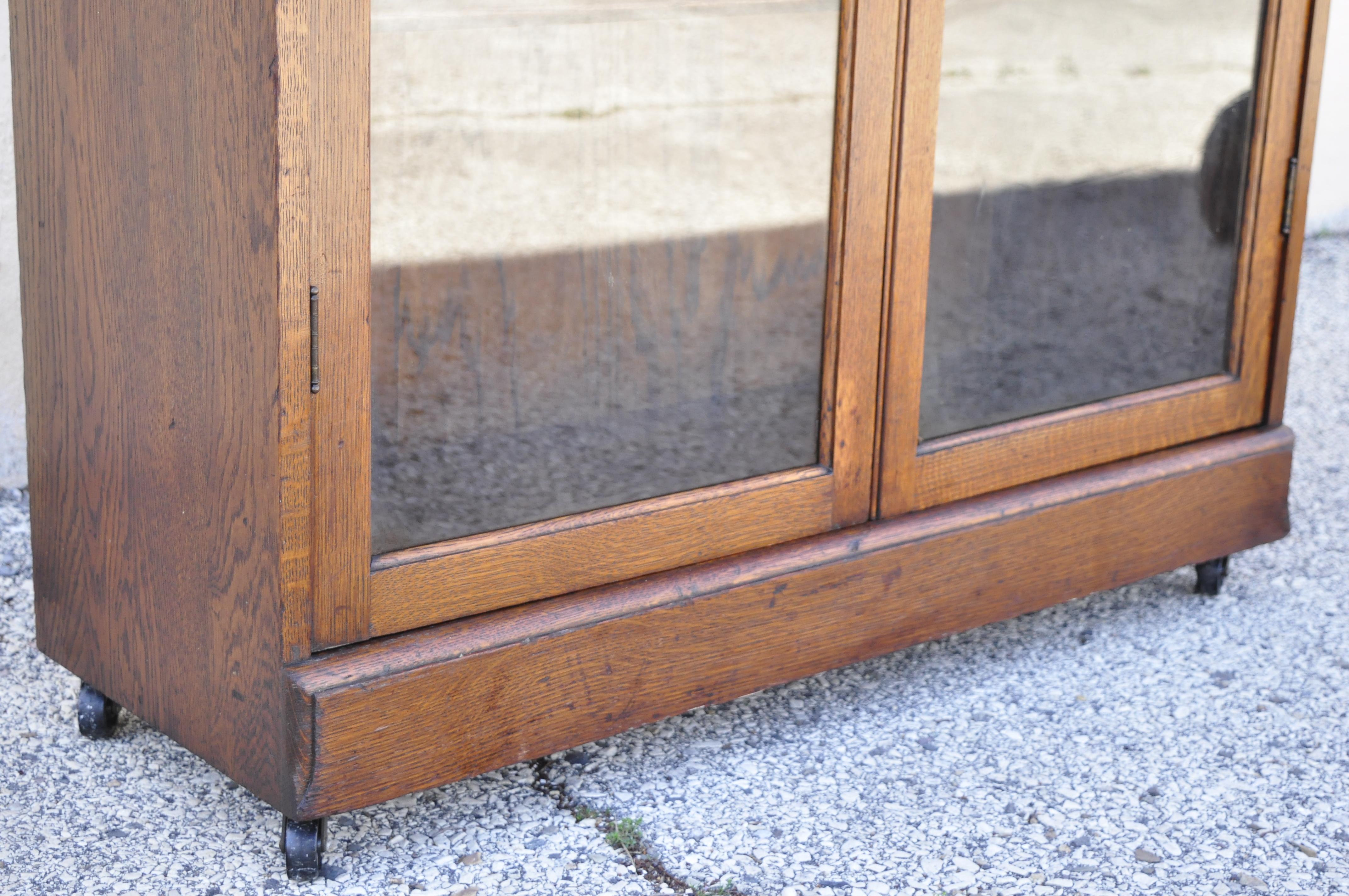 short curio cabinet with glass doors