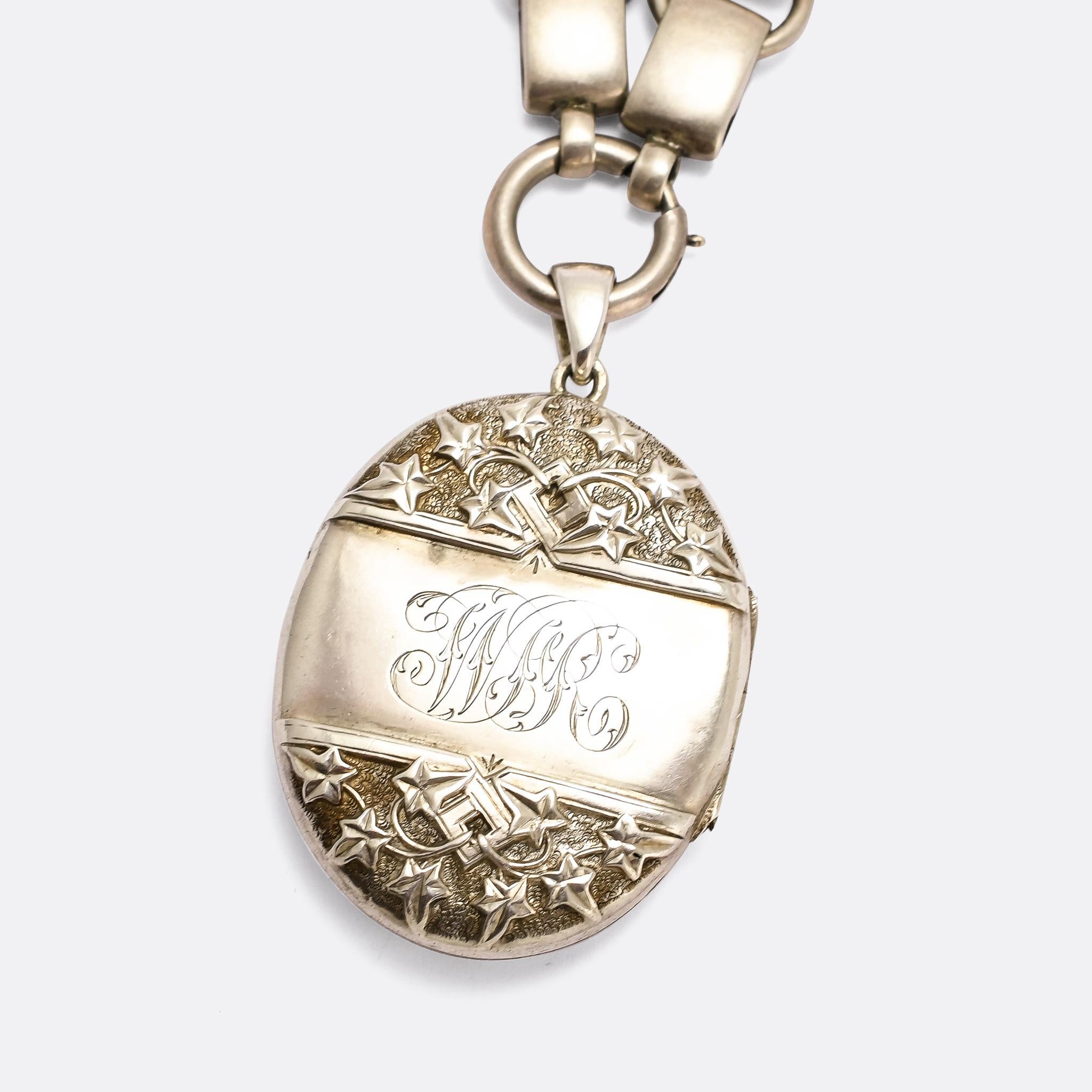 A cool Victorian silver locket and collar dating from the 1880s. The locket features deeply engraved ivy leaf motifs with the word MIZPAH emblazoned across the middle. The collar has been finely chased with abstract foliate motifs. All modelled in