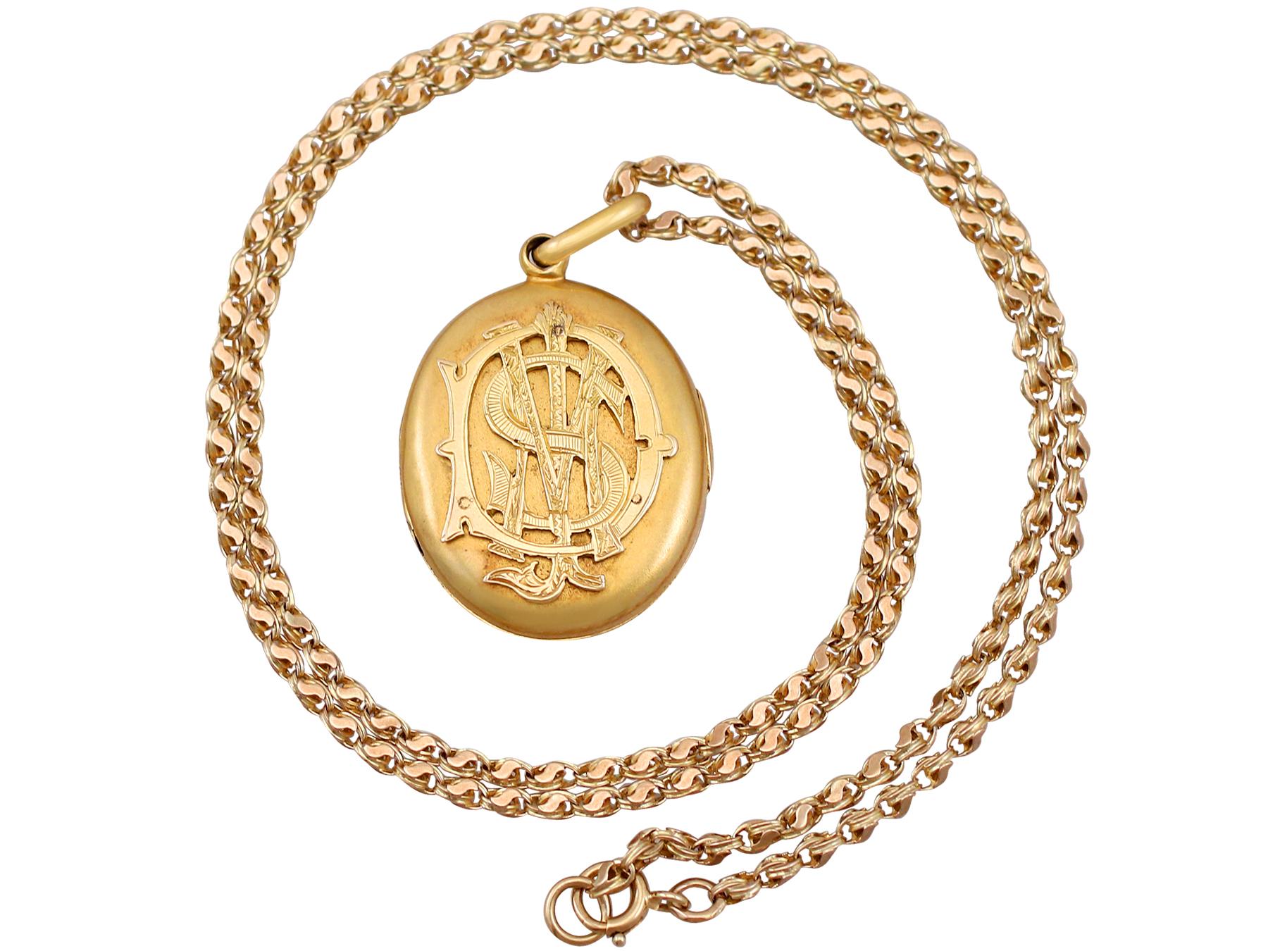 An impressive antique Victorian 15 karat yellow gold locket with 9 karat yellow gold chain; part of our diverse antique jewelry and estate jewelry collections.

This fine and impressive antique gold locket has been crafted in 15k yellow gold.

The