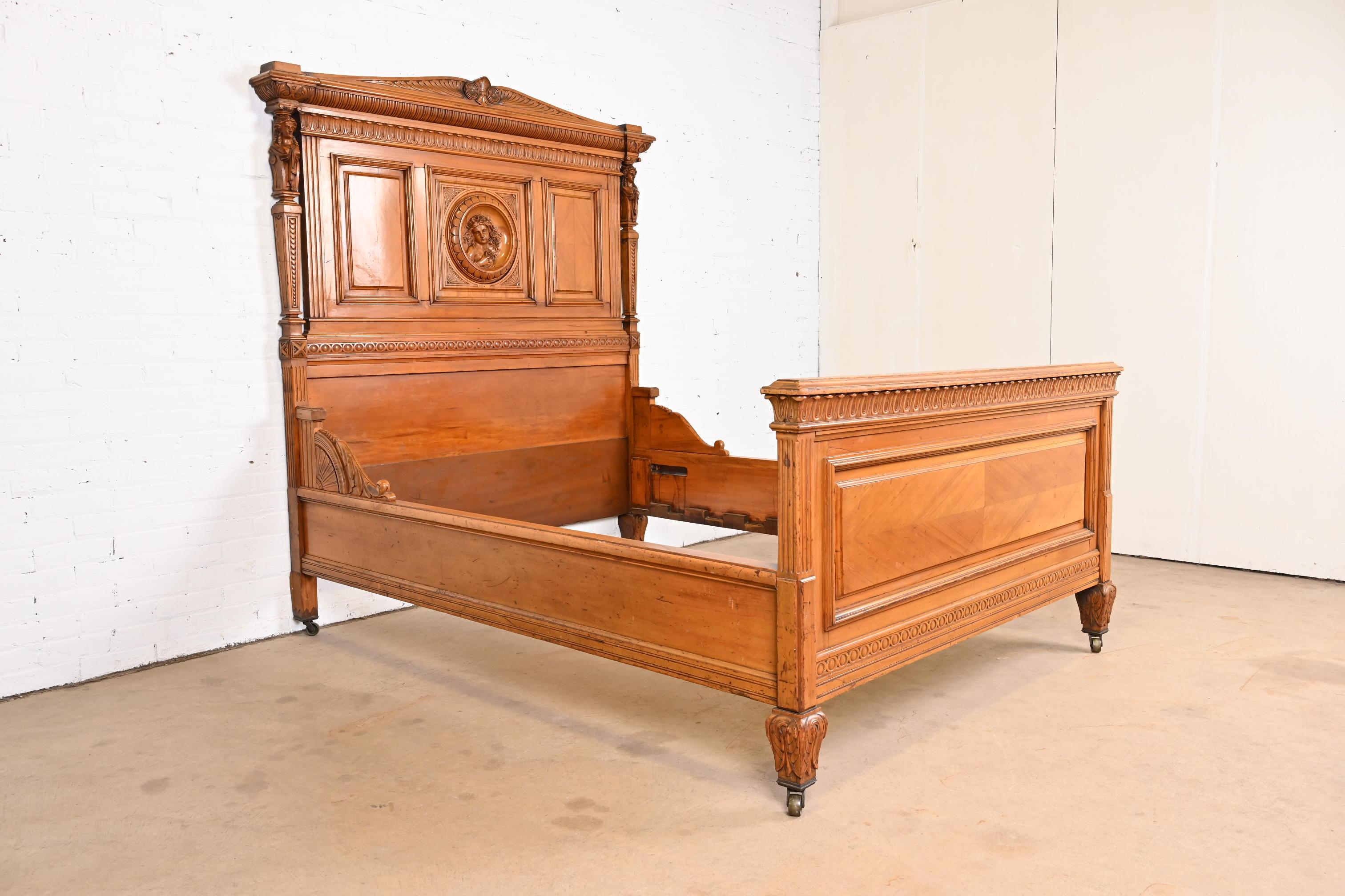 American Antique Victorian Monumental Carved Walnut Full Size Bed Attributed to Horner For Sale