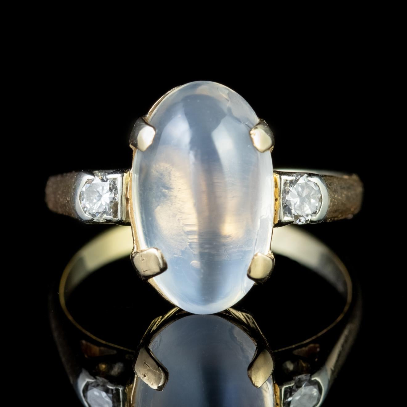 This Victorian Moonstone and Diamond ring is built around a stunning 4ct cabochon cut Moonstone, flanked with two old cut Diamonds totalling approx. 0.20ct.

Moonstones have a lovely ghostly hue and a luminous surface similar to that of Moonlight.