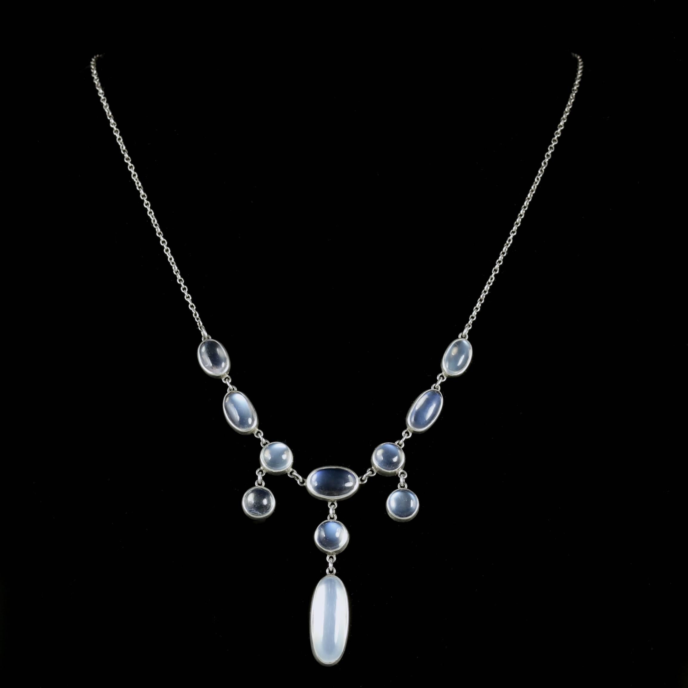 This elegant Victorian Silver necklace is set with glowing Moonstones that have a ghostly hue, Circa 1900.

A lovely Moonstone droppers hang wonderfully on this necklace.

The beautiful Moonstone has a lovely ghostly hue, since earliest times,