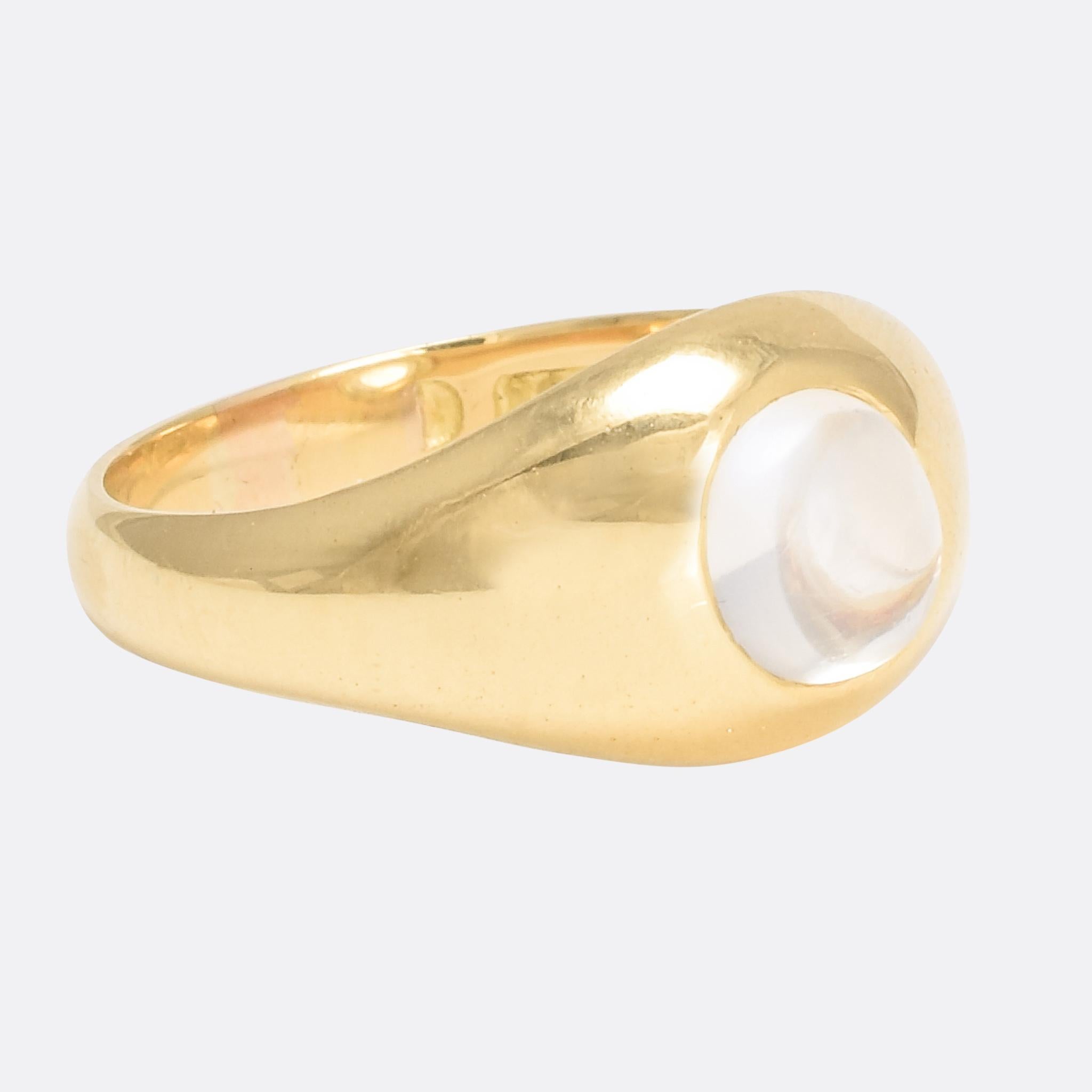A classic solitaire gypsy ring set with an oval moonstone cabochon. Modelled in 18 karat gold, it dates from the latter half of the 19th Century - circa 1880. A popular style, suitable for women and men alike.

STONES 
Natural Moonstone - 6.5 x
