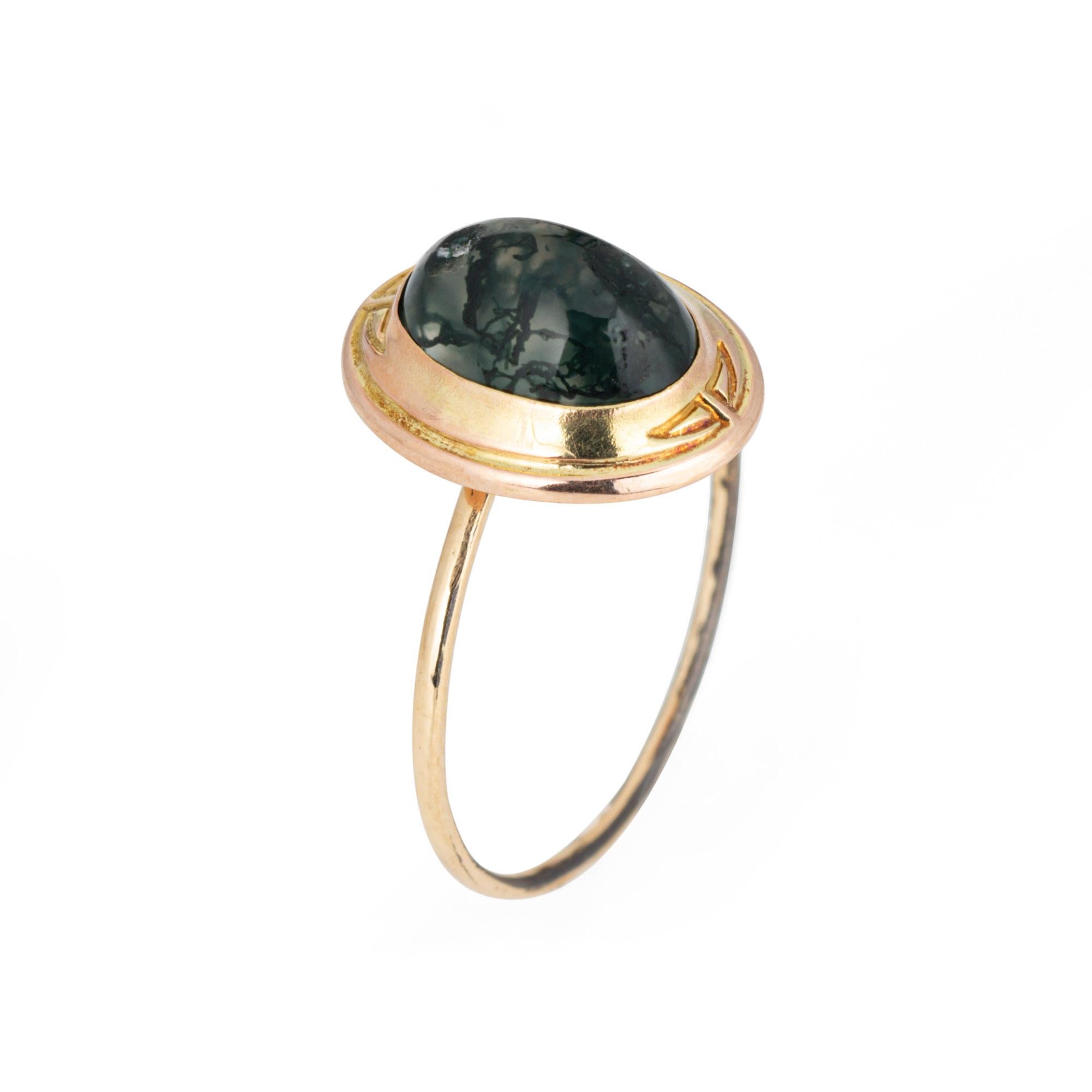Originally an antique Victorian era stick pin (circa 1880s to 1900s), the moss agate ring is crafted in 14 karat yellow gold.

The ring is mounted with the original stick pin. Our jeweler rounded the stick pin into a slim band for the finger. The