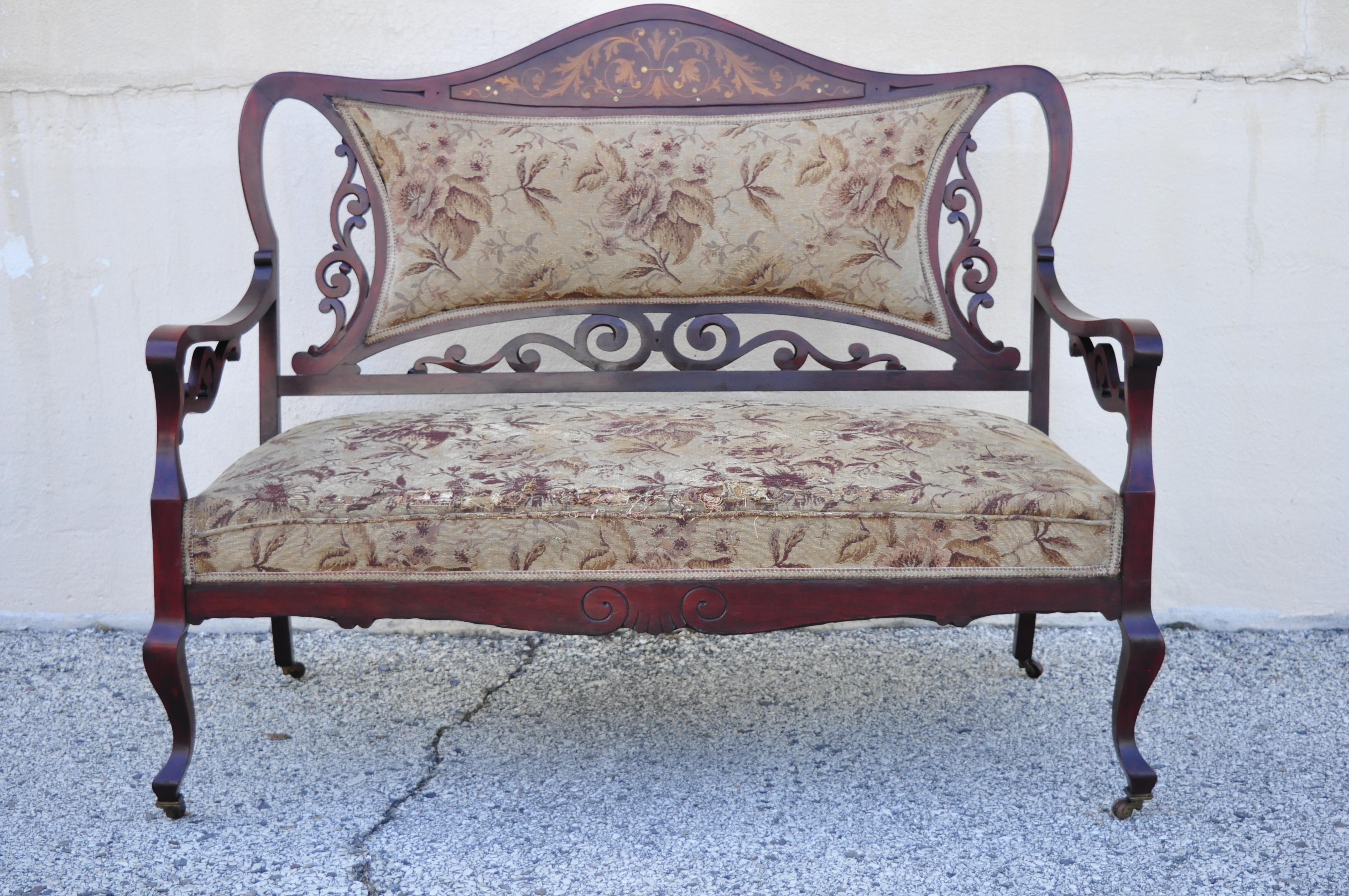 Antique Victorian mother of pearl satinwood inlay mahogany sofa & 2 chairs parlor set, 3-piece set. Item features satinwood floral inlay, mother of pearl inlay, brass rolling casters, solid wood frame, beautiful wood grain, nicely carved scrollwork