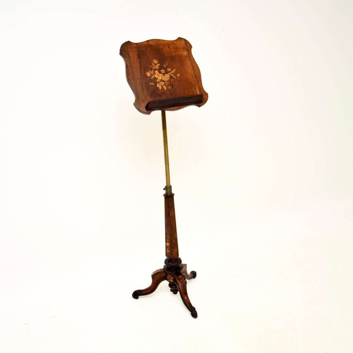A stunning antique Victorian music stand. This was made in England, it dates from around the 1850-1870 period.

It is of extremely fine quality, the surface has stunning grain patterns and fine inlaid patterns of satinwood and other woods. The top
