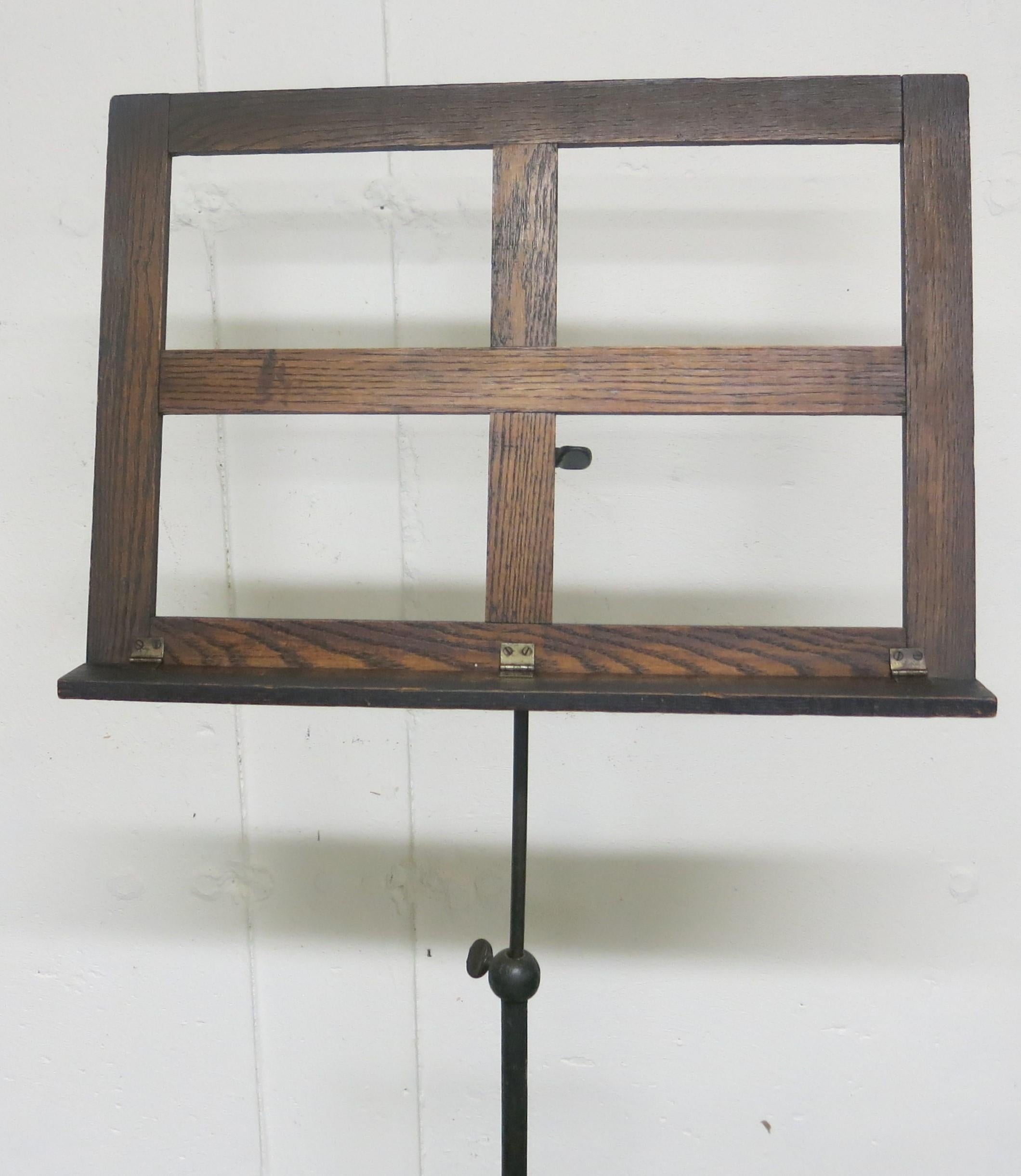 Victorian oak and iron music stand. Adjustable height and angle. It raises from 44